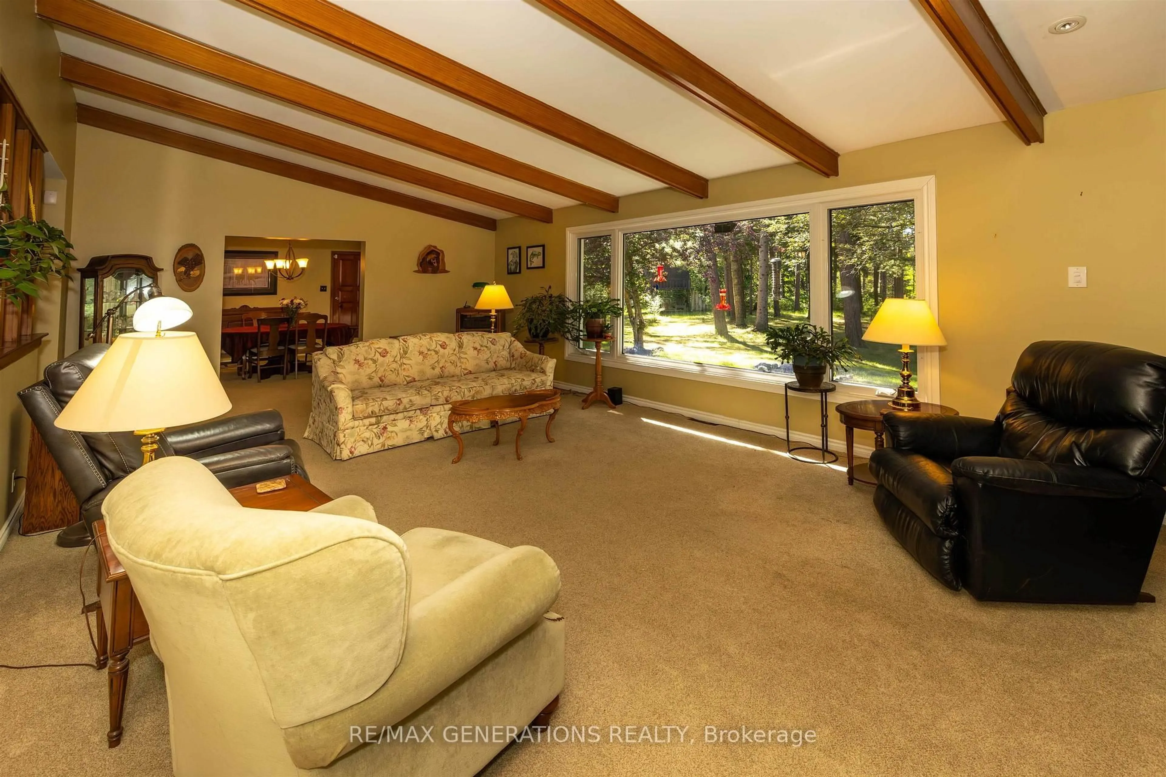 Living room with furniture, carpet floor for 4508 Highway 11-17, Oliver Paipoonge Ontario P7K 0J1