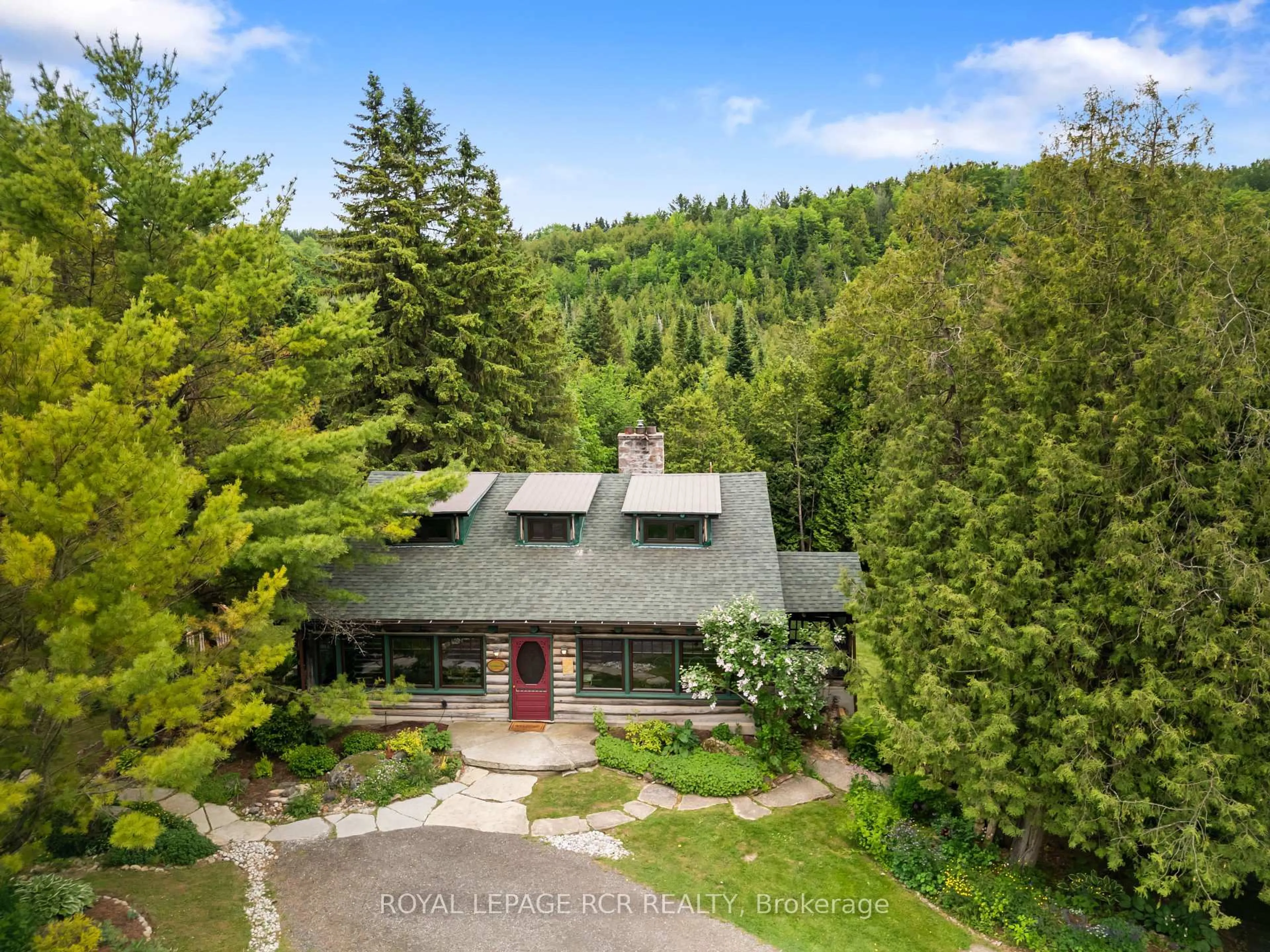 A pic from outside/outdoor area/front of a property/back of a property/a pic from drone, forest/trees view for 307114 Hockley Rd, Mono Ontario L9W 6N6