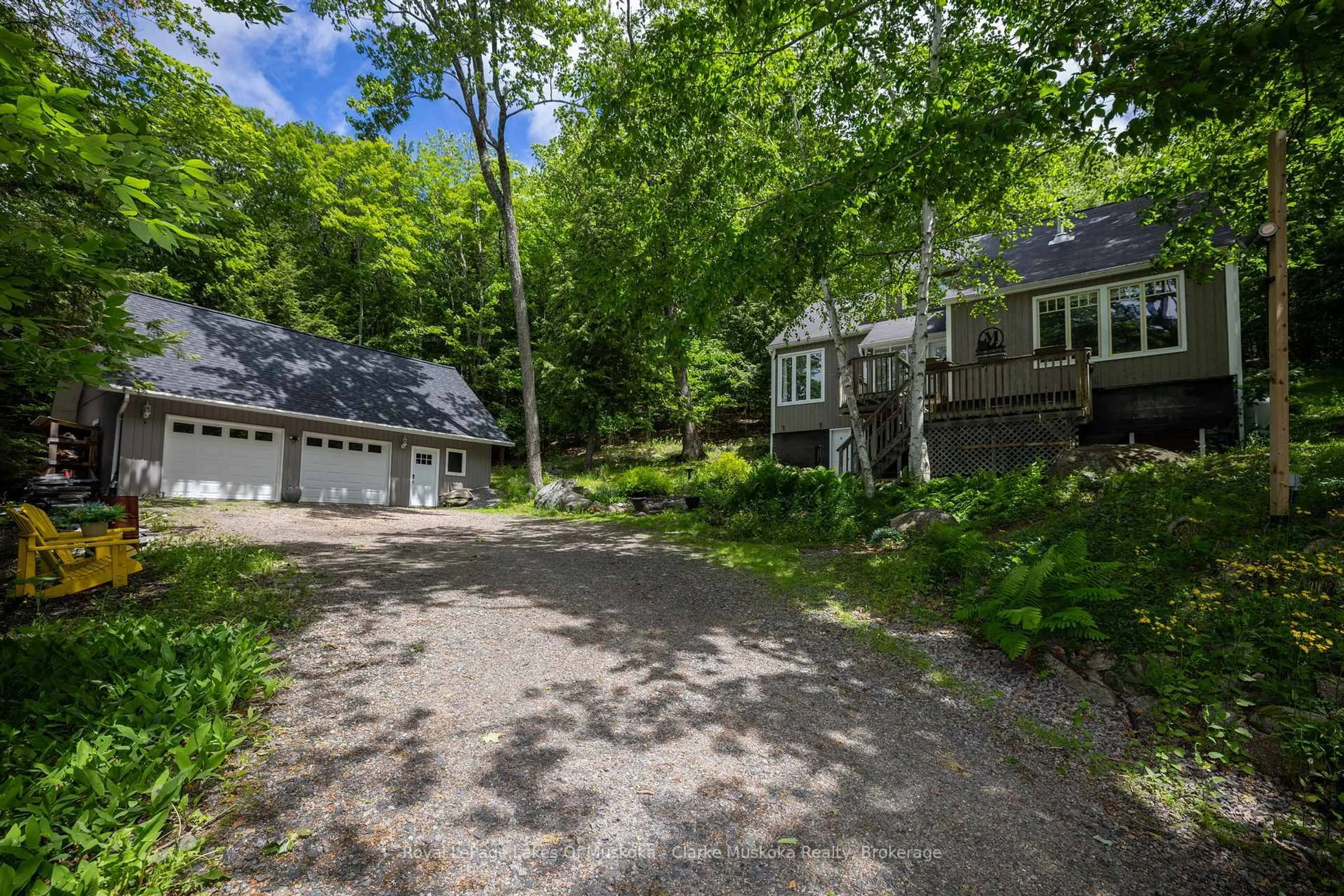 A pic from outside/outdoor area/front of a property/back of a property/a pic from drone, street for 1037 Foreman Rd, Muskoka Lakes Ontario P0B 1J0