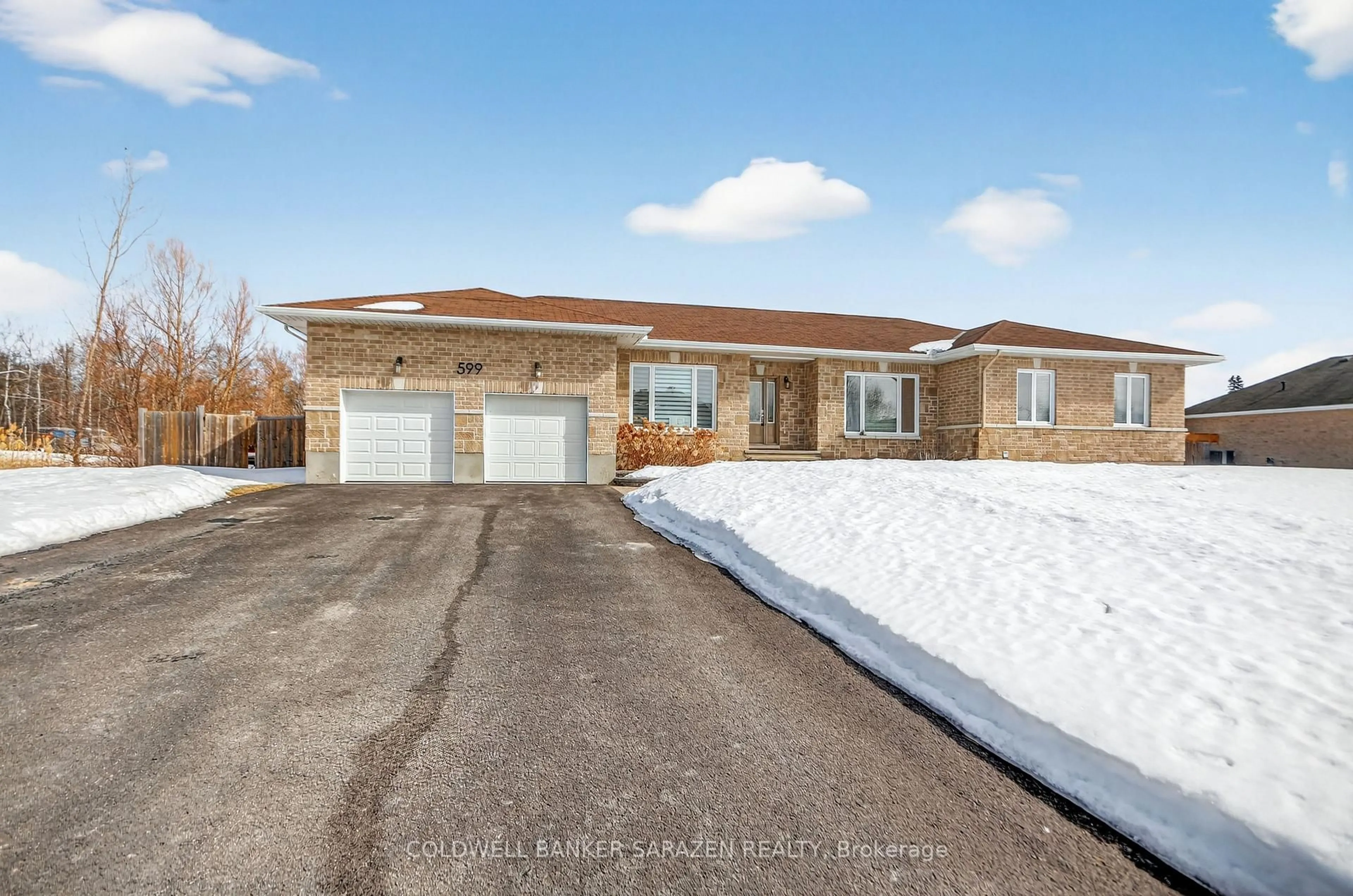 Home with brick exterior material, street for 599 Ballycastle Cres, Ottawa Ontario K1X 0A2