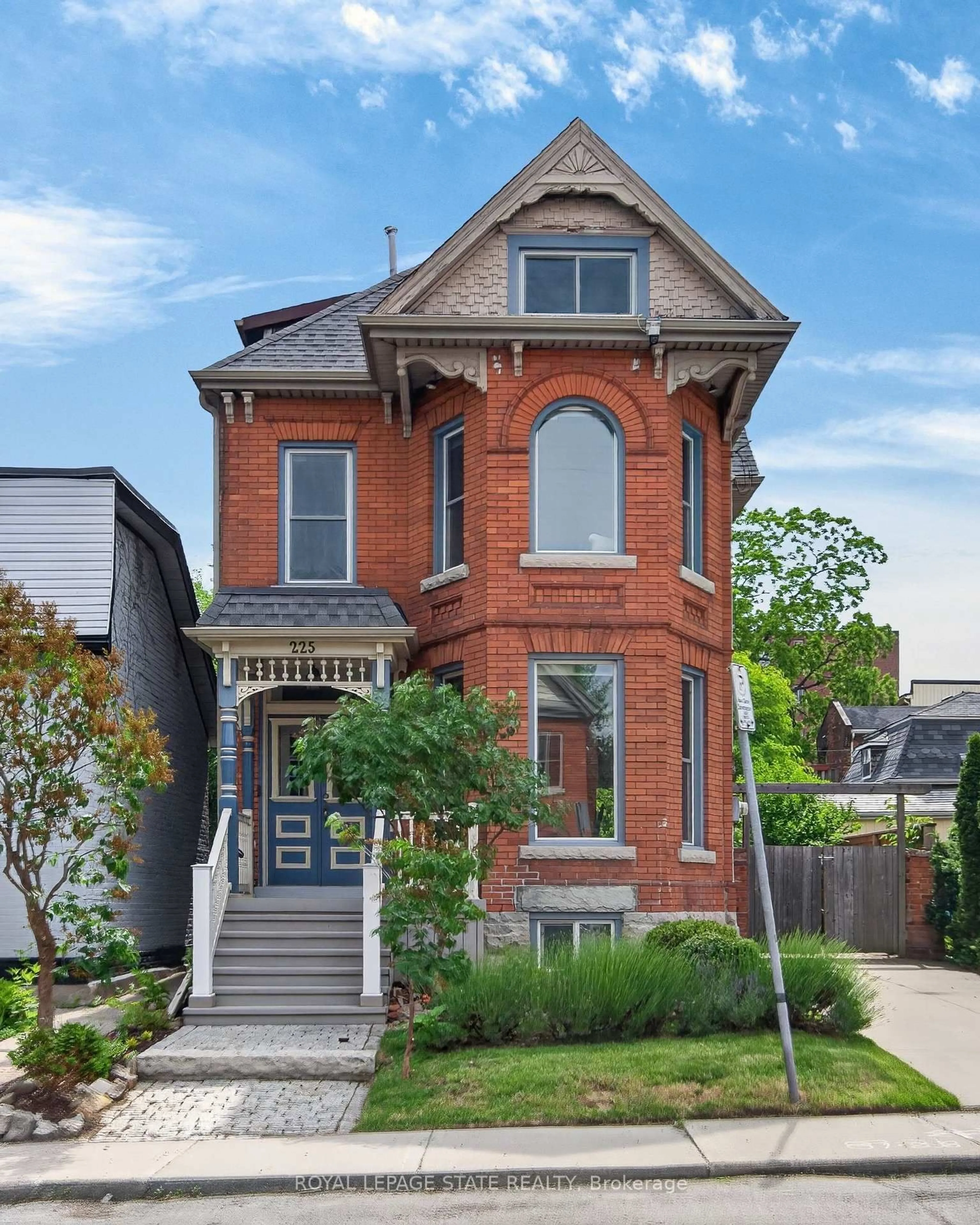 Home with brick exterior material, street for 225 Hess St, Hamilton Ontario L8P 3P3