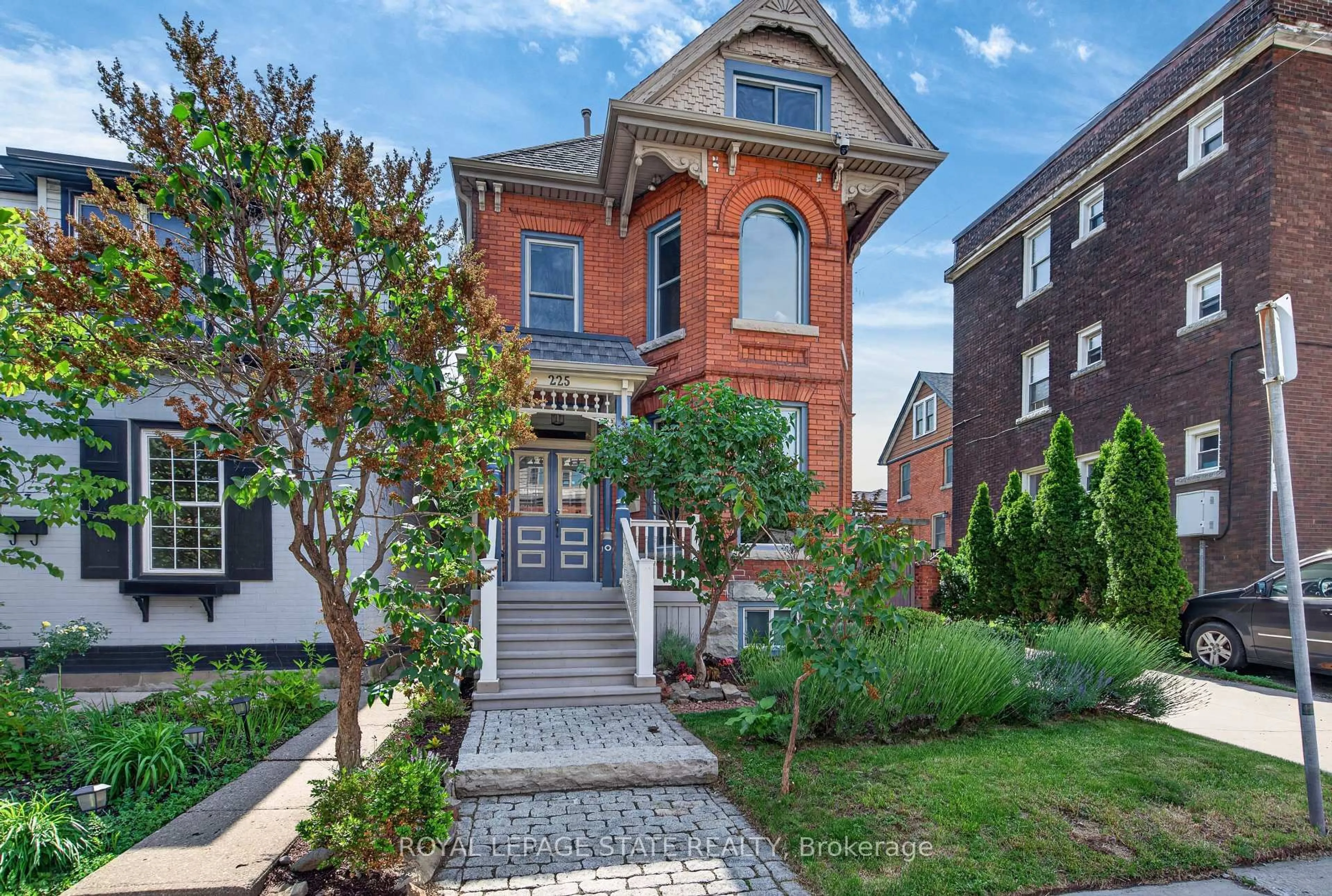 Home with brick exterior material, street for 225 Hess St, Hamilton Ontario L8P 3P3