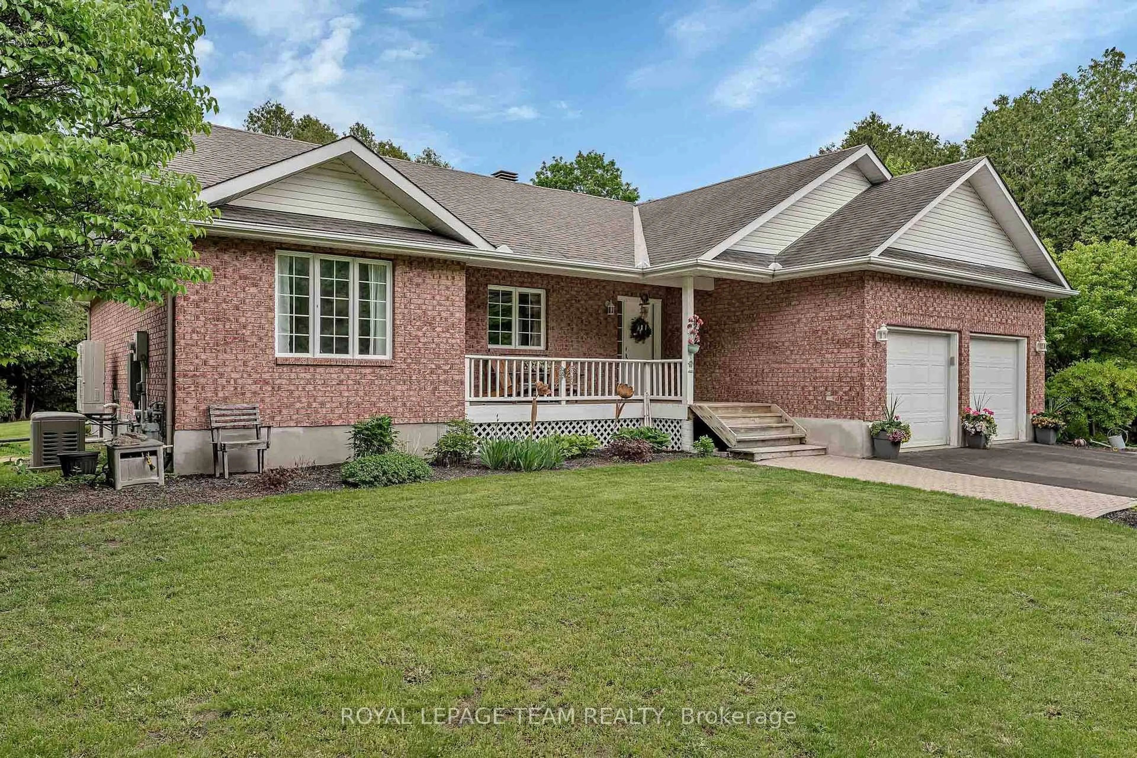 Home with brick exterior material, street for 6515 Waddion Dr, Ottawa Ontario K4P 1E7