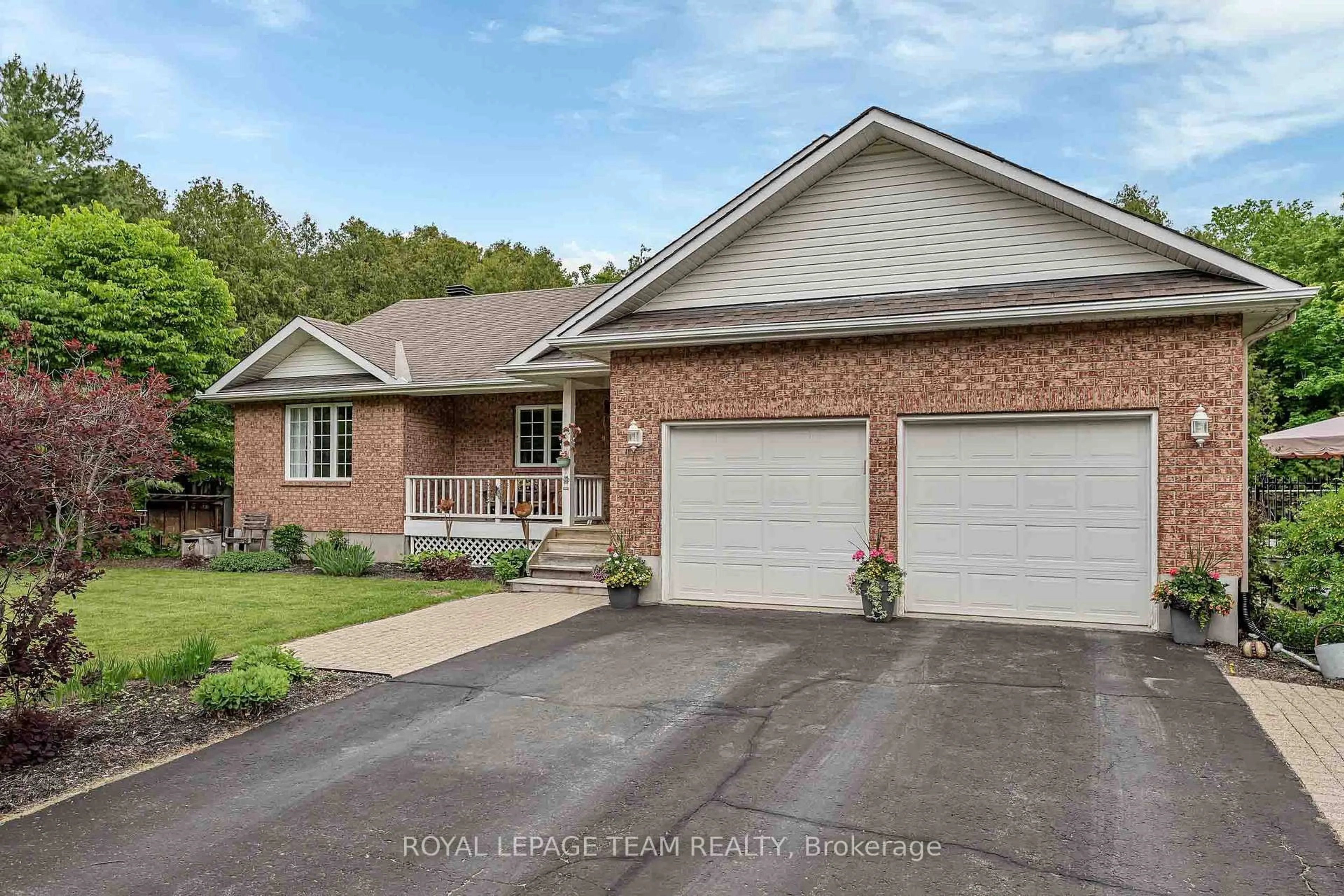 Home with brick exterior material, street for 6515 Waddion Dr, Ottawa Ontario K4P 1E7