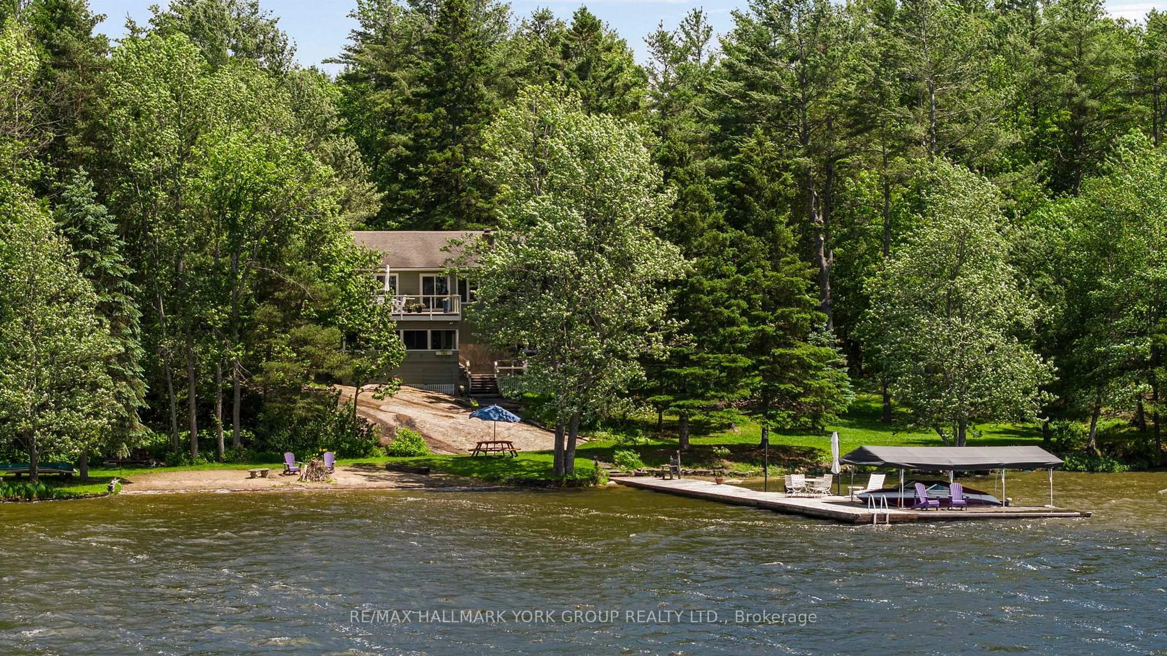 A pic from outside/outdoor area/front of a property/back of a property/a pic from drone, water/lake/river/ocean view for 1291 Brackenrig Rd, Muskoka Lakes Ontario P0B 1J0