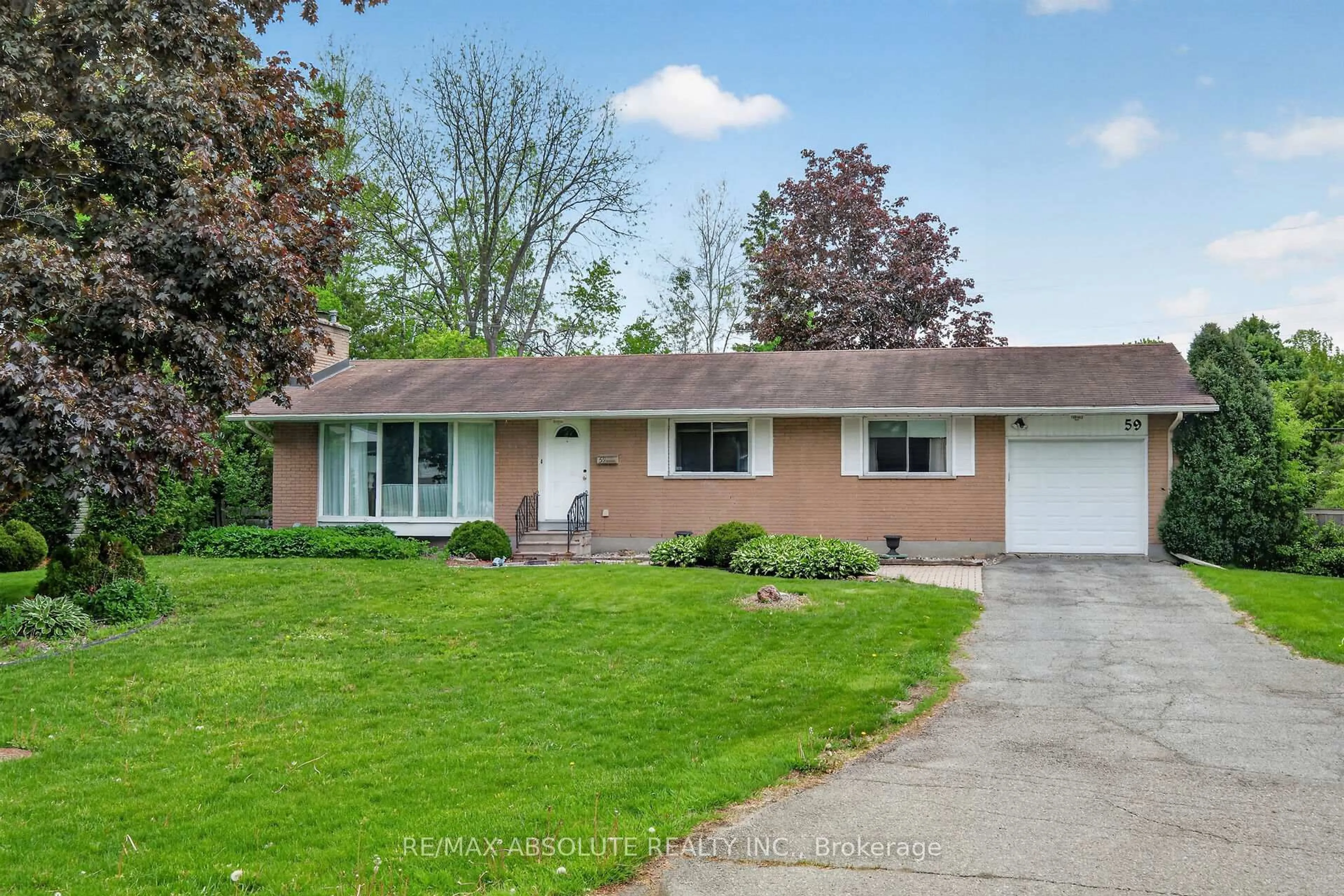 Home with vinyl exterior material, street for 59 Evergreen Dr, Ottawa Ontario K2H 6C5