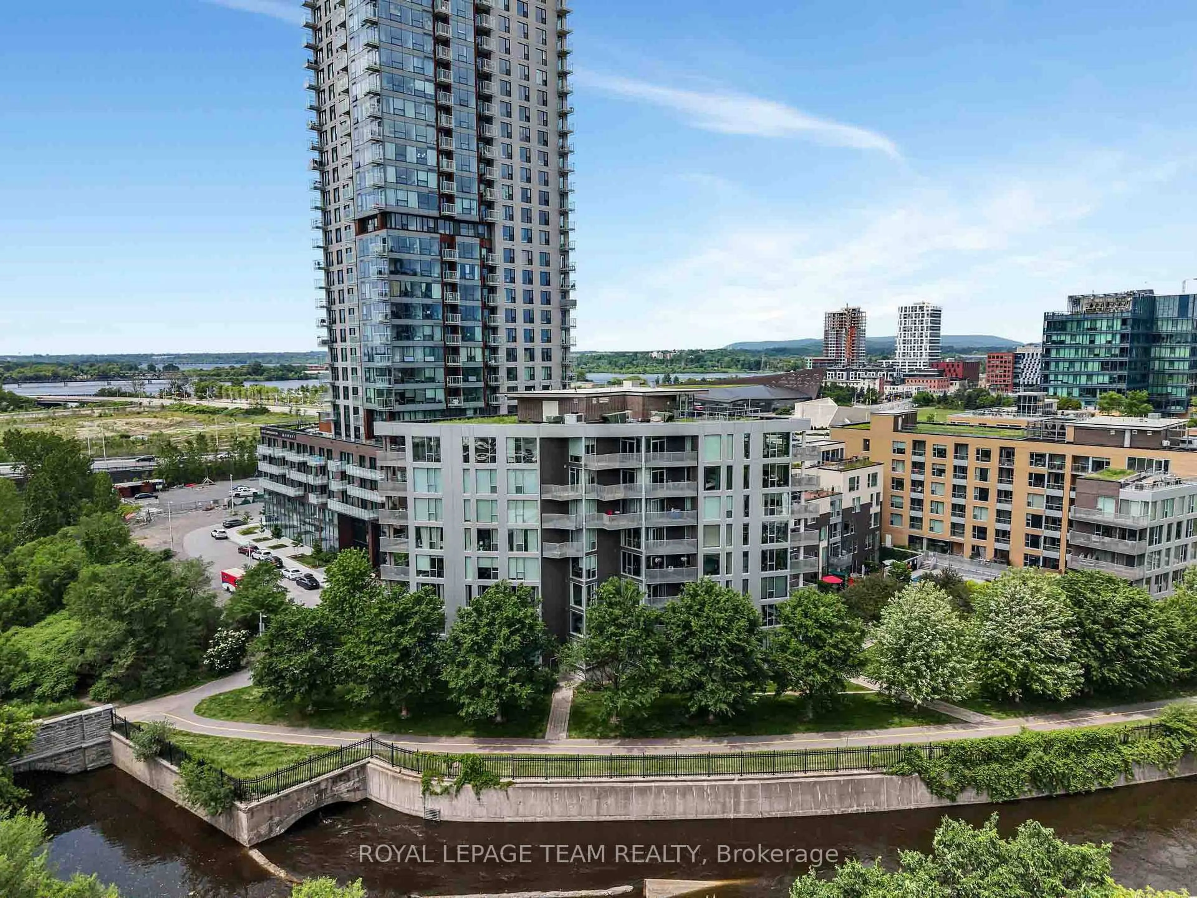 A pic from outside/outdoor area/front of a property/back of a property/a pic from drone, city buildings view from balcony for 300C Lett St #324, Ottawa Ontario K1R 0A8