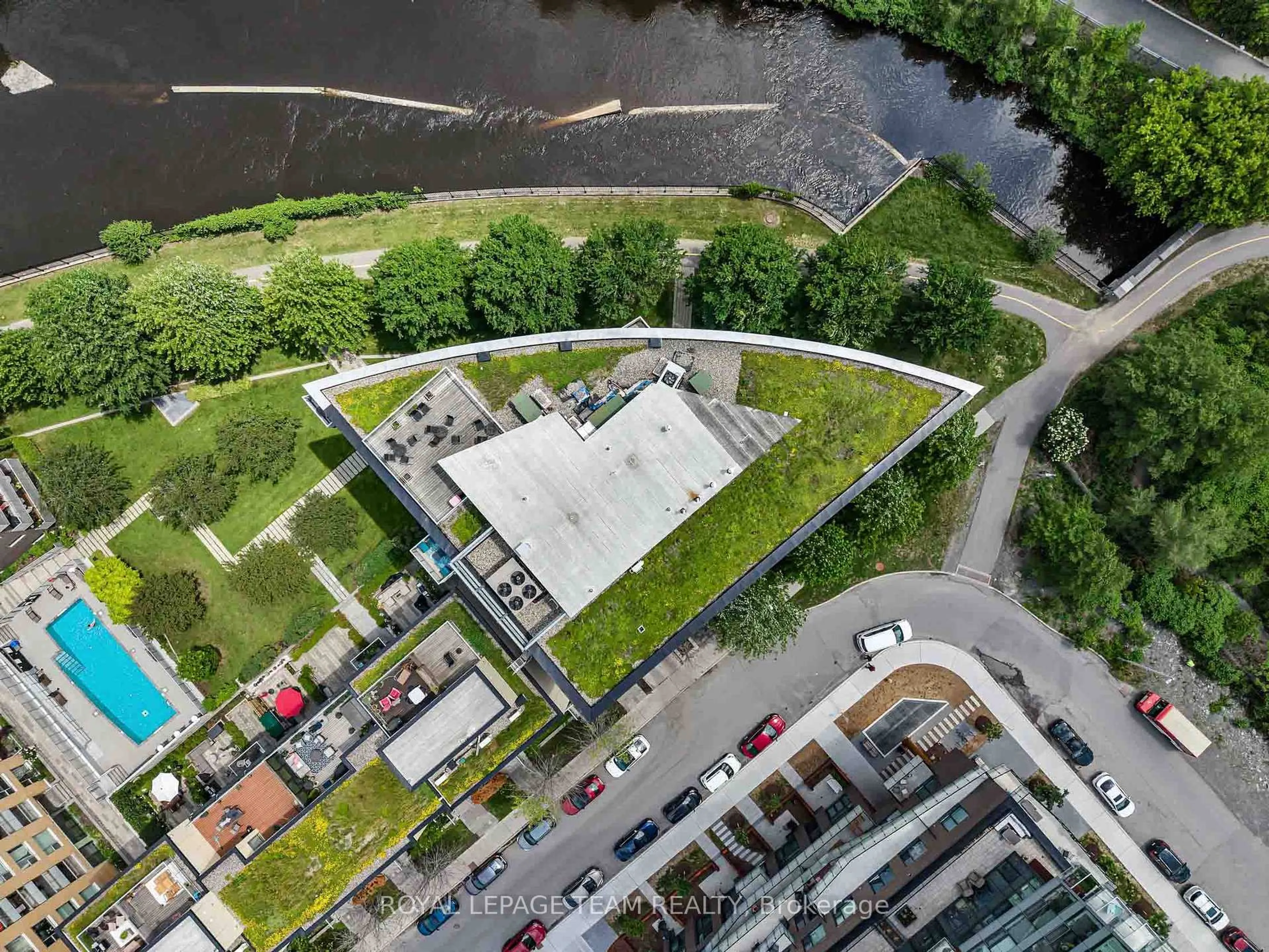 A pic from outside/outdoor area/front of a property/back of a property/a pic from drone, city buildings view from balcony for 300C Lett St #324, Ottawa Ontario K1R 0A8