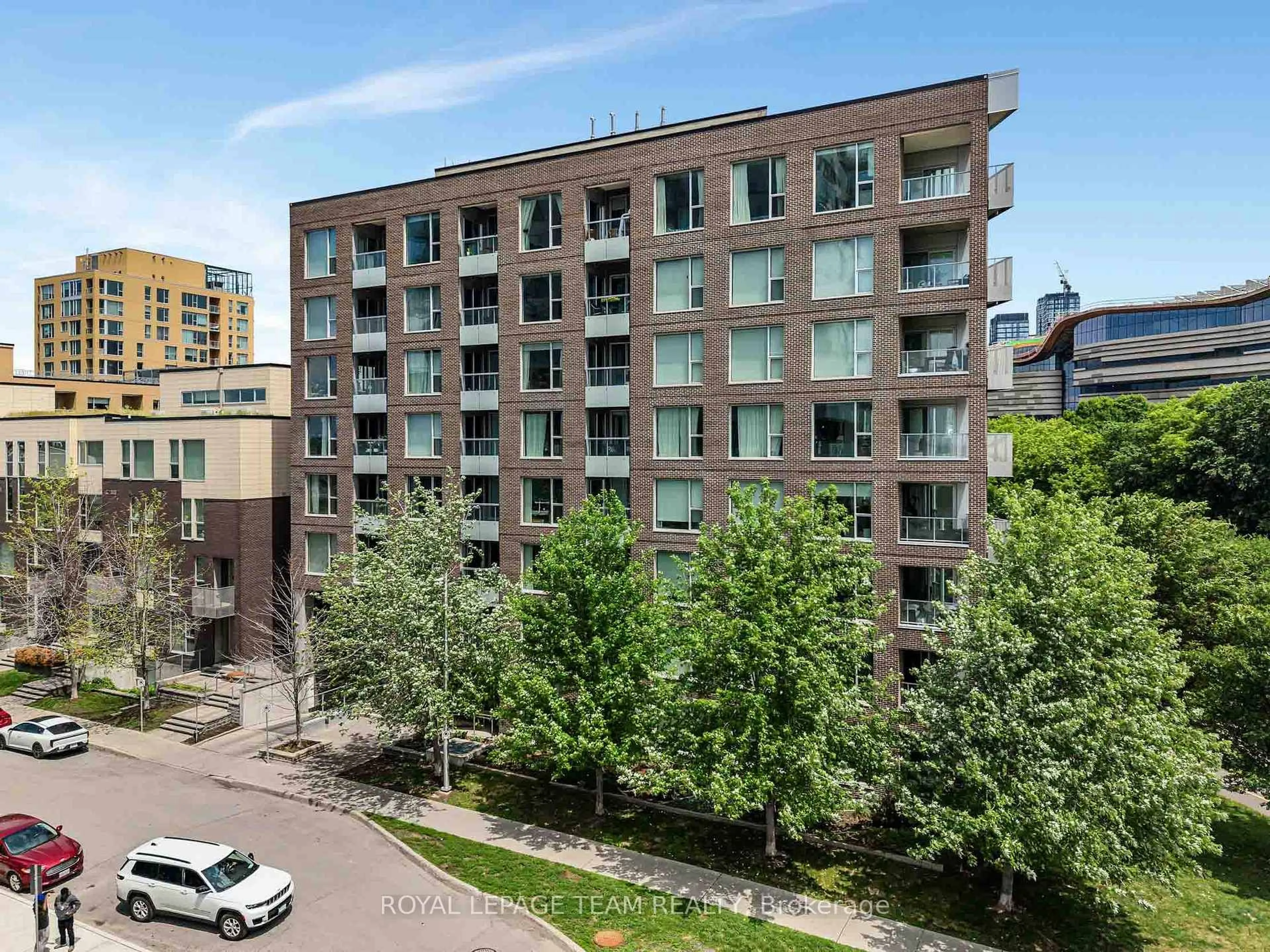 A pic from outside/outdoor area/front of a property/back of a property/a pic from drone, city buildings view from balcony for 300C Lett St #324, Ottawa Ontario K1R 0A8