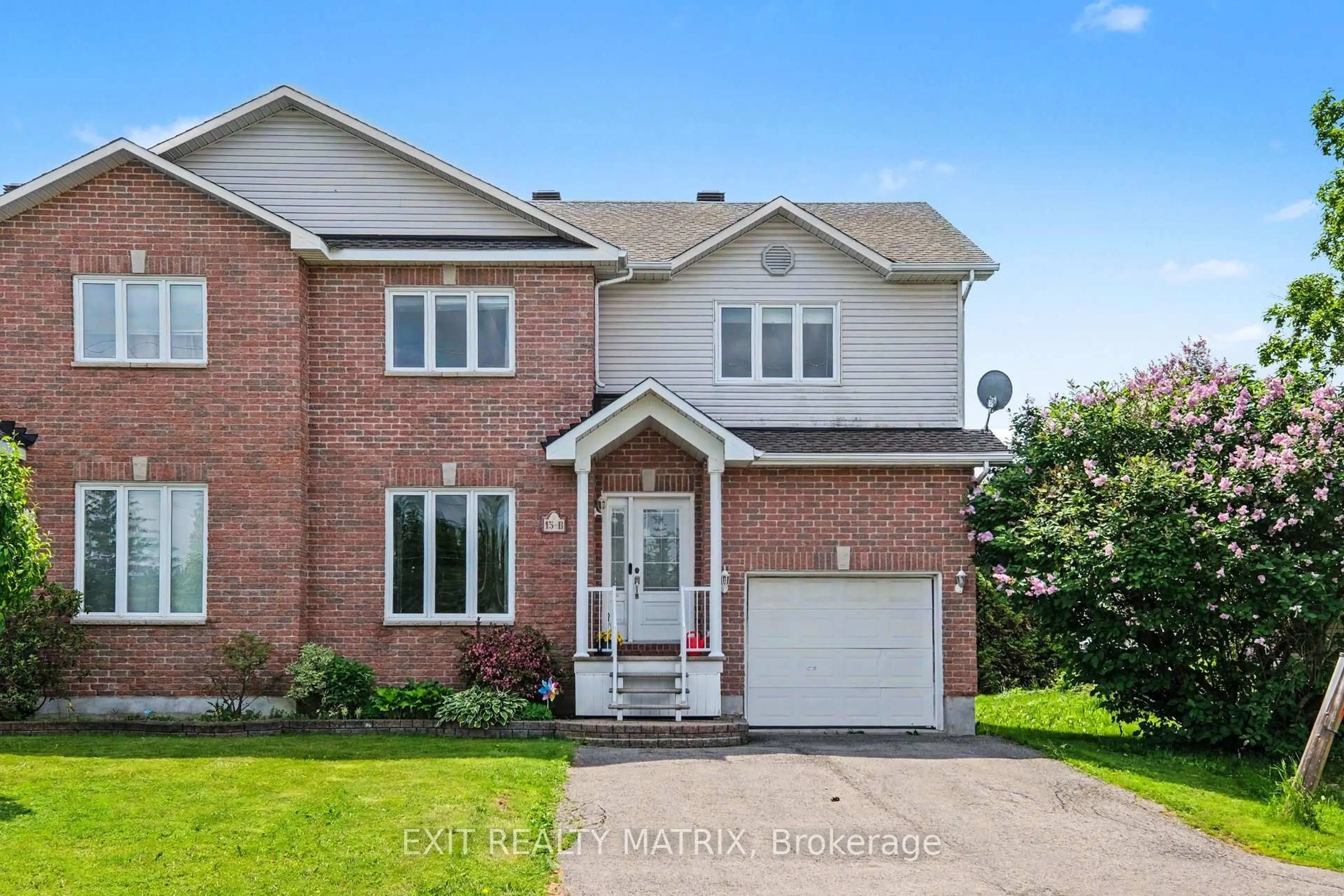 Home with brick exterior material, street for 15 Blais St #B, Russell Ontario K0A 1W0