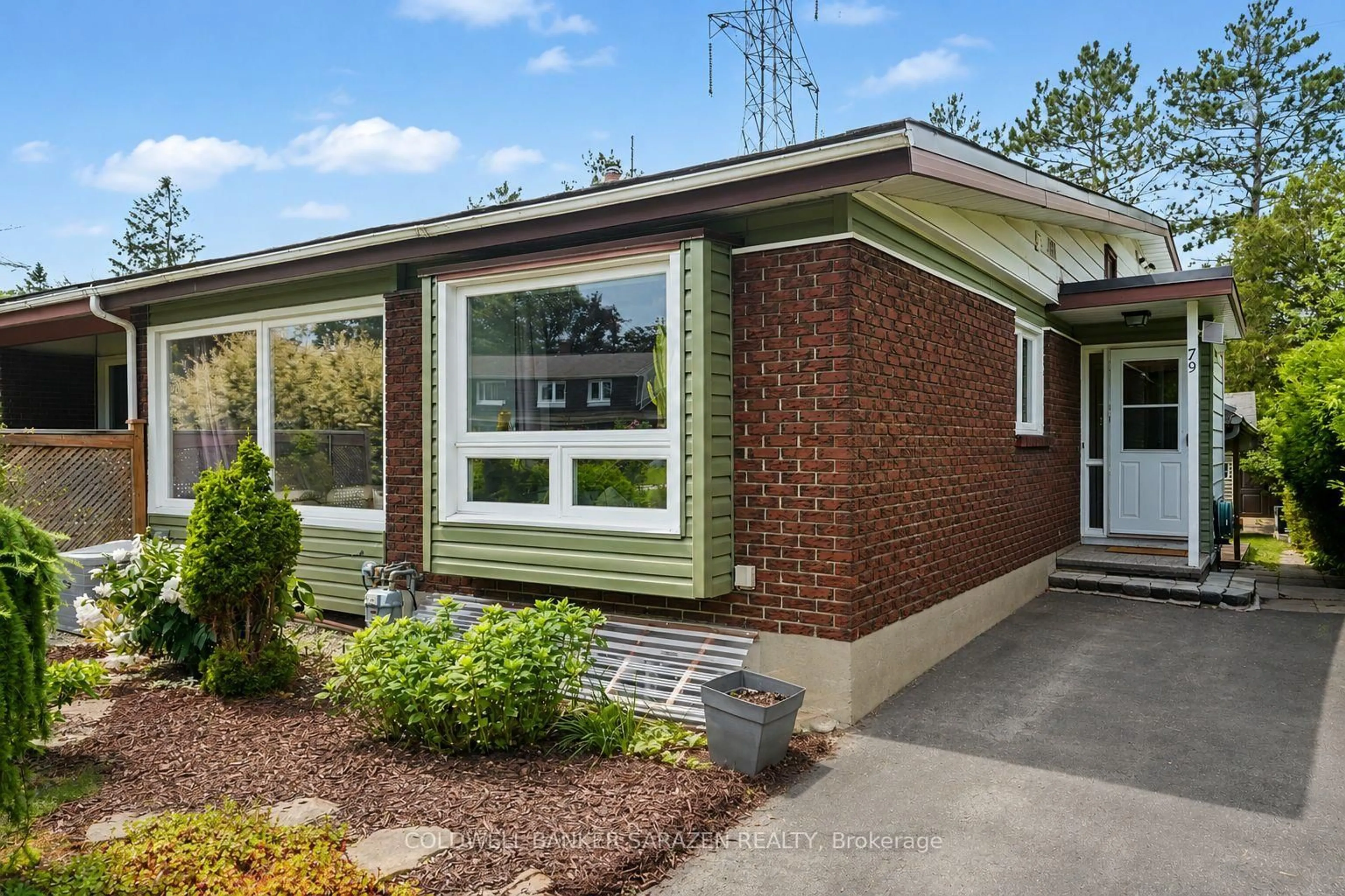 Home with brick exterior material, street for 79 Woodfield Dr, Ottawa Ontario K2G 0A1