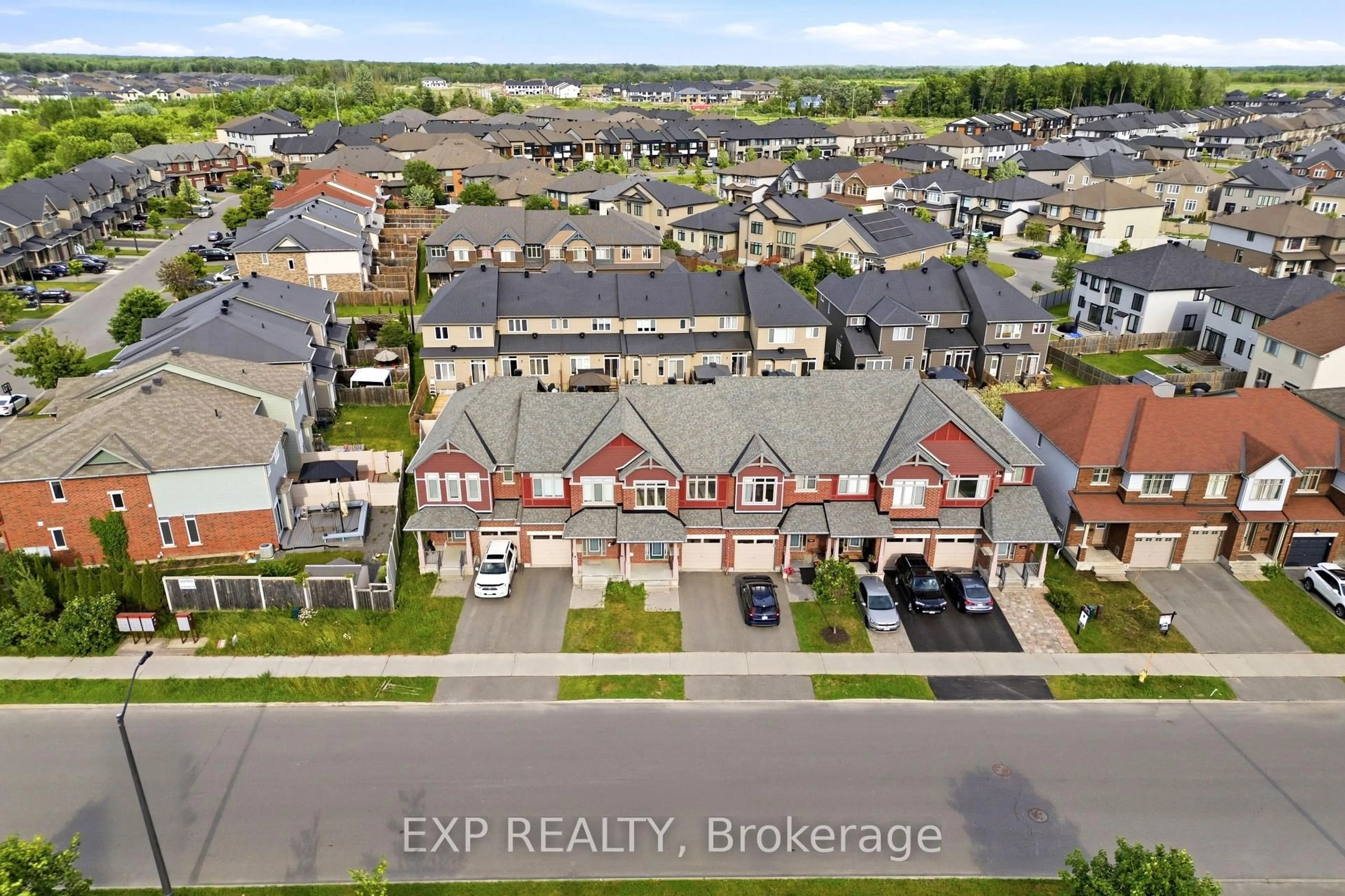 A pic from outside/outdoor area/front of a property/back of a property/a pic from drone, street for 704 Brian Good Ave, Ottawa Ontario K4M 0C1