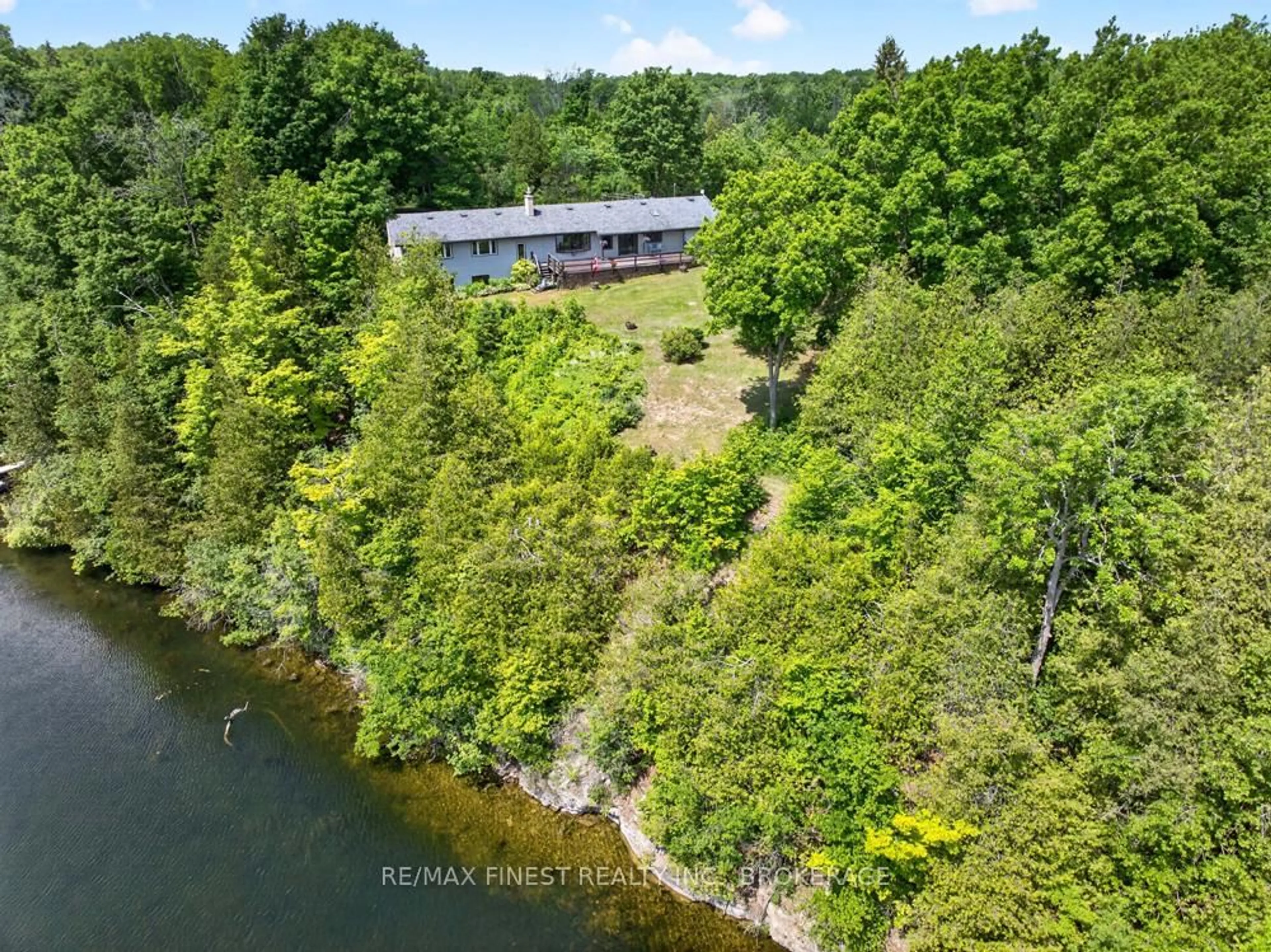 A pic from outside/outdoor area/front of a property/back of a property/a pic from drone, water/lake/river/ocean view for 1034 Sally Lane, Sydenham Ontario K0H 2T0