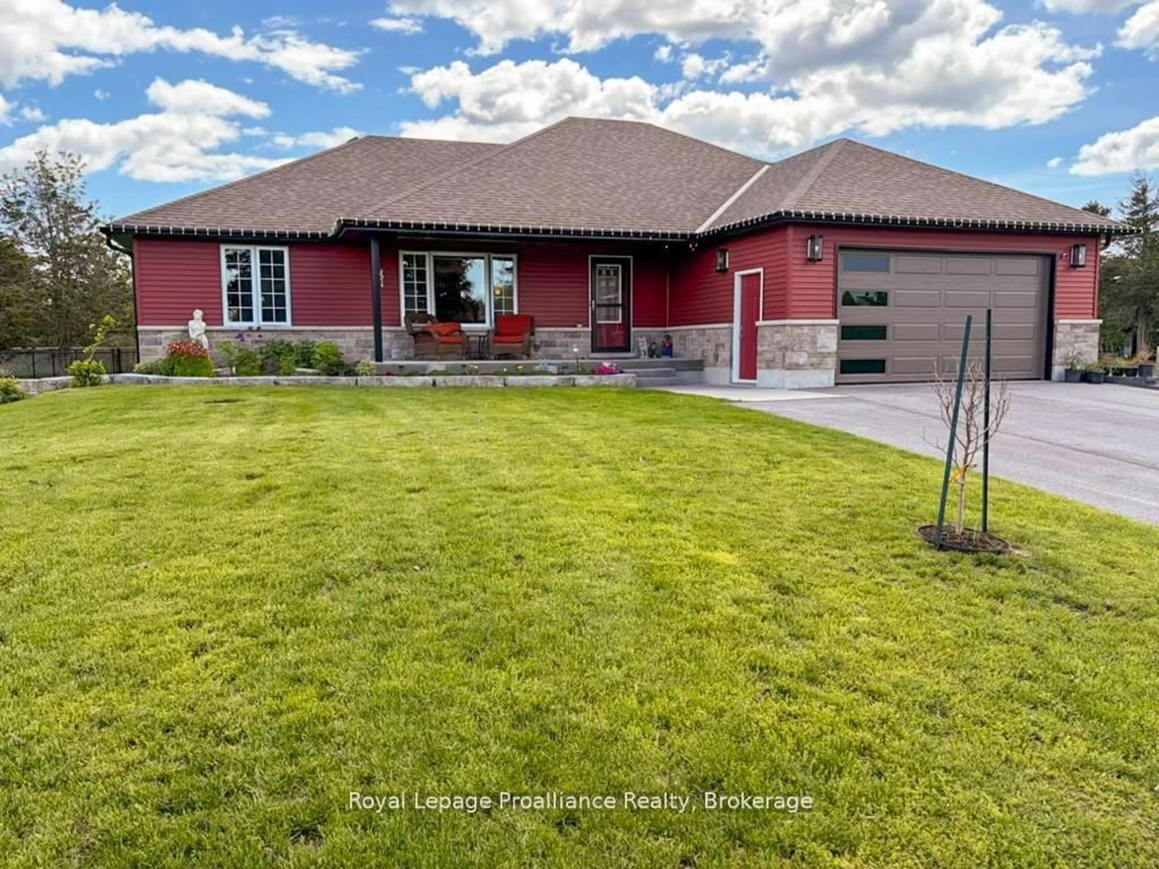 A pic from outside/outdoor area/front of a property/back of a property/a pic from drone, water/lake/river/ocean view for 3741 County Road 3, Prince Edward County Ontario K0K 1L0