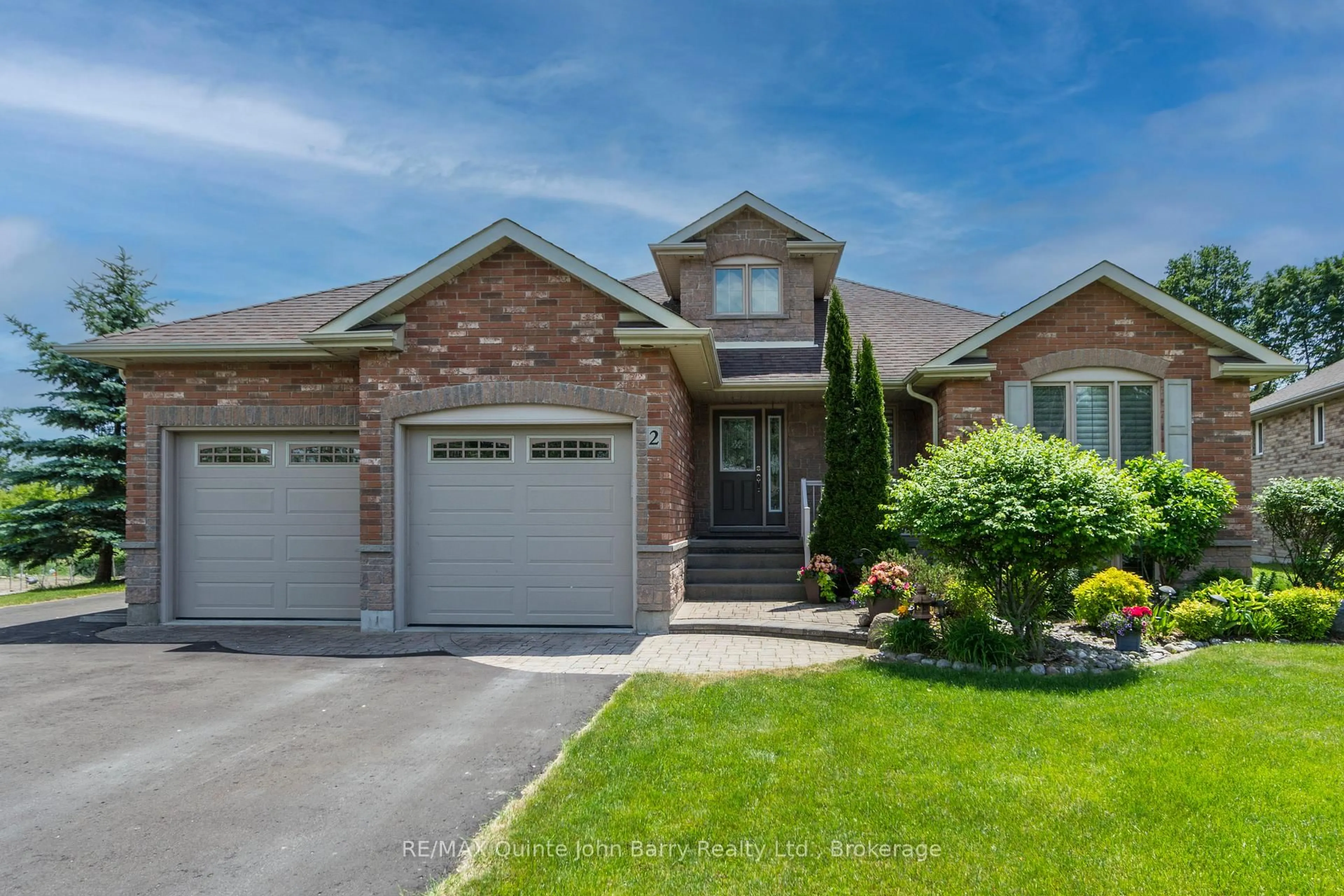 Home with brick exterior material, street for 2 Pine Marsh Lane, Quinte West Ontario K8V 0A5
