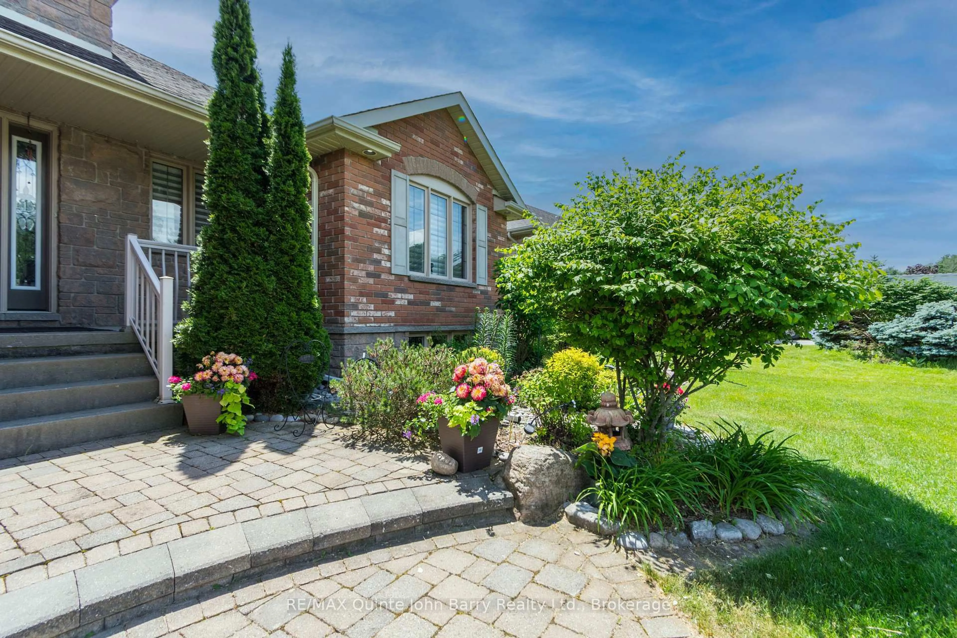 Home with brick exterior material, street for 2 Pine Marsh Lane, Quinte West Ontario K8V 0A5