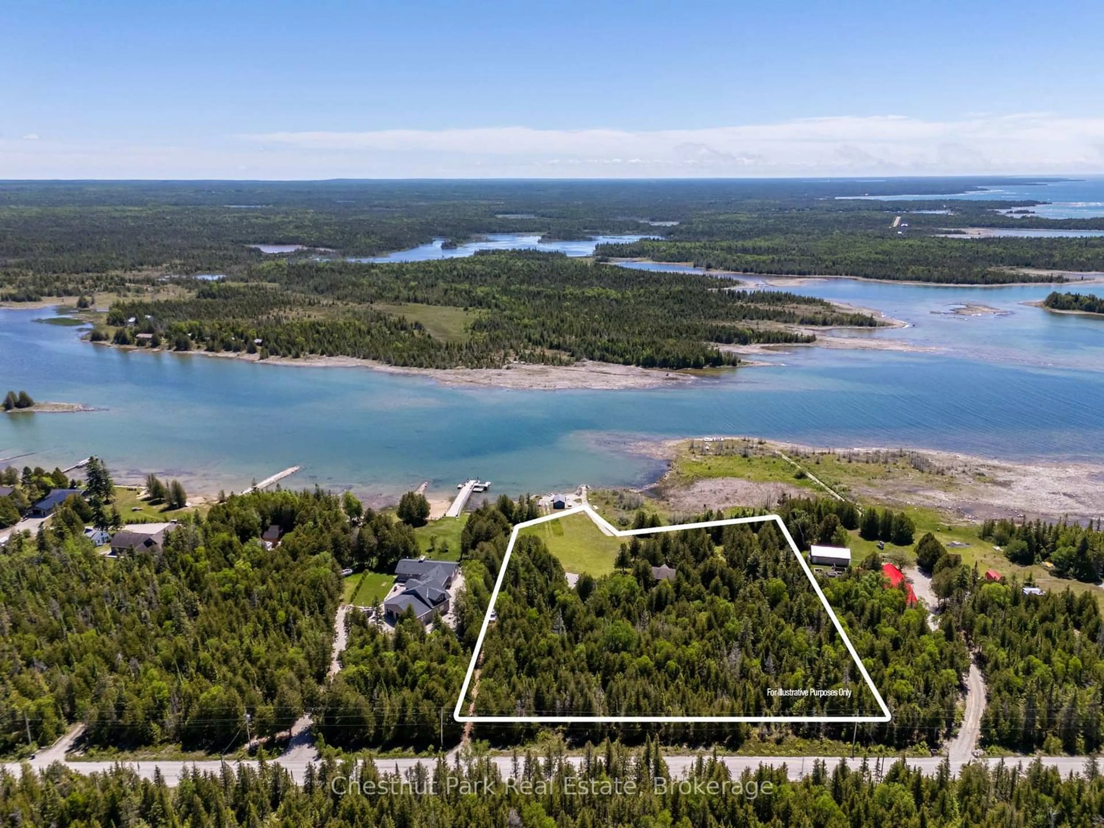 A pic from outside/outdoor area/front of a property/back of a property/a pic from drone, water/lake/river/ocean view for 79 Pine Tree Harbour Rd, Northern Bruce Peninsula Ontario N0H 1Z0