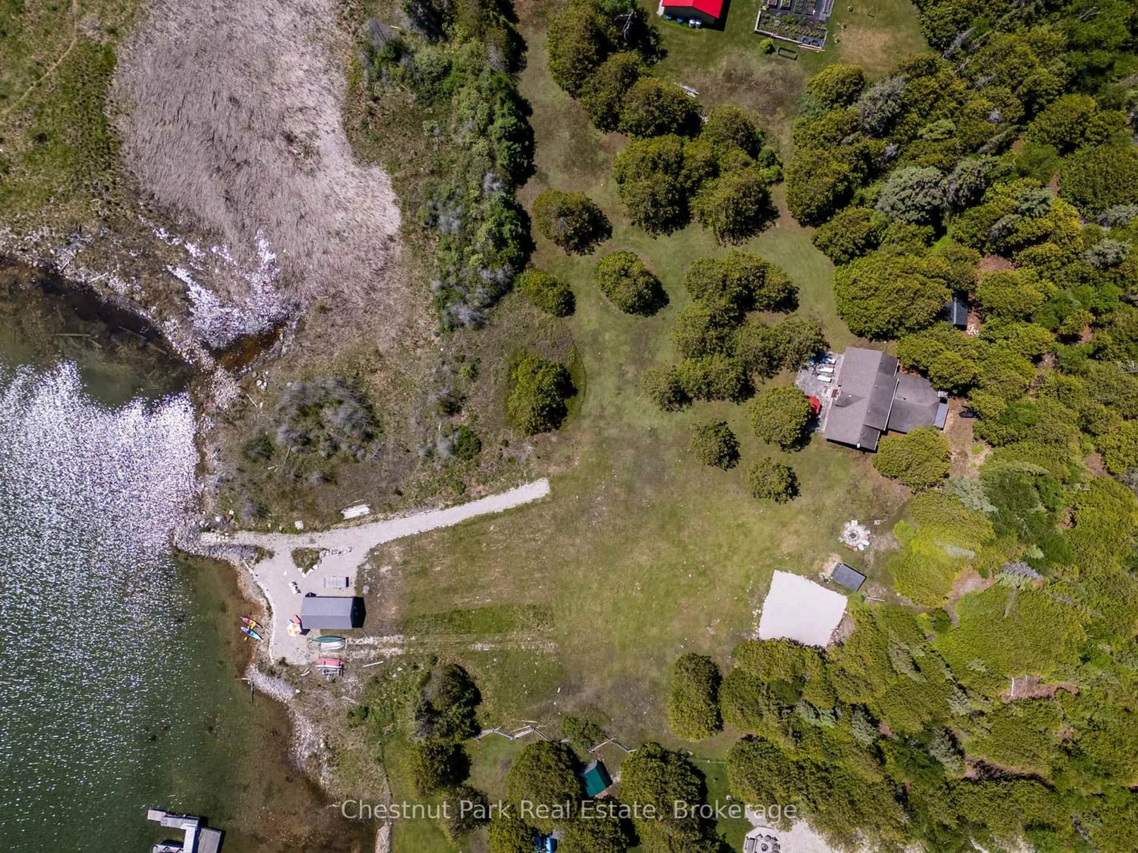 A pic from outside/outdoor area/front of a property/back of a property/a pic from drone, water/lake/river/ocean view for 79 Pine Tree Harbour Rd, Northern Bruce Peninsula Ontario N0H 1Z0