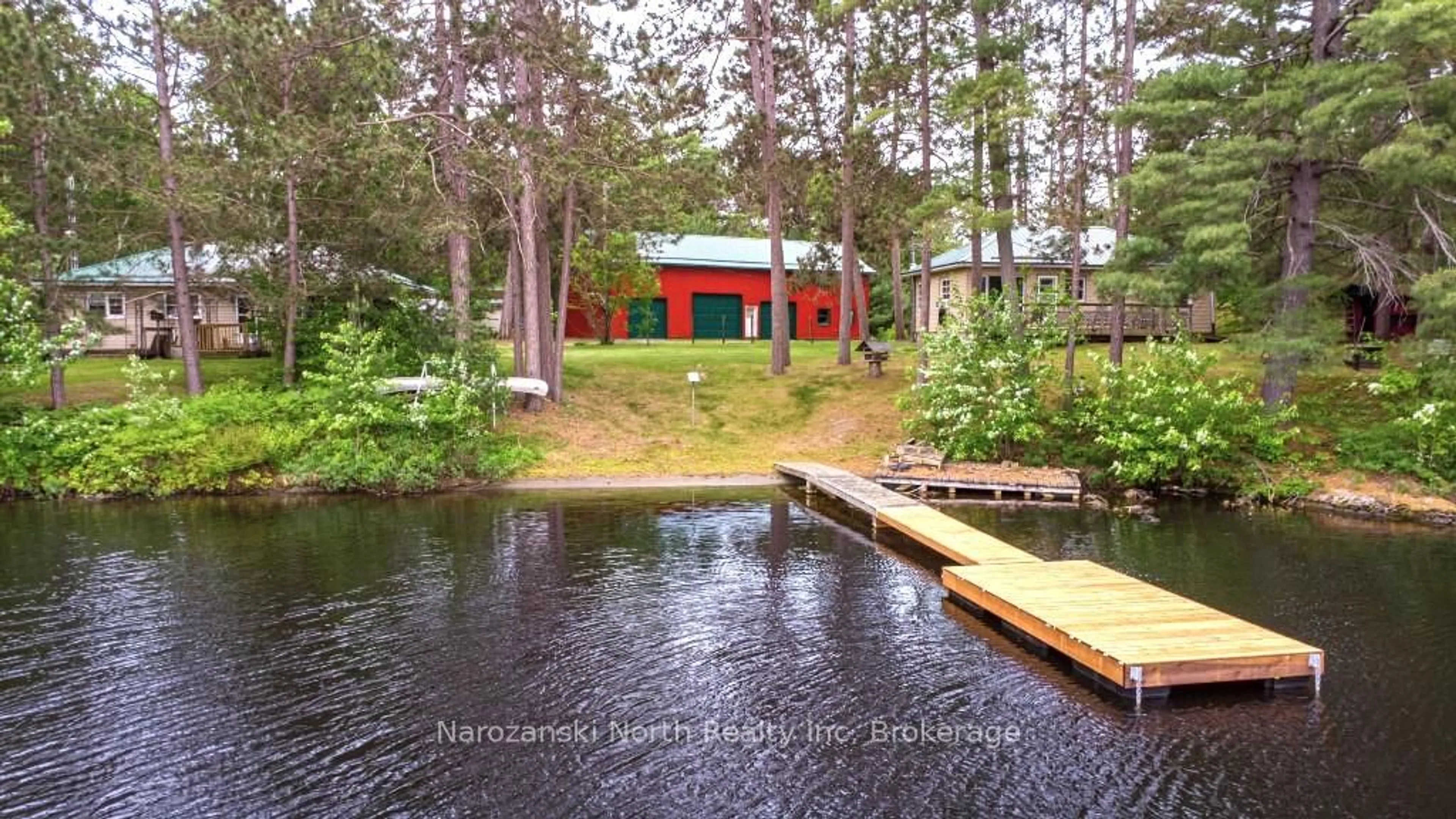 A pic from outside/outdoor area/front of a property/back of a property/a pic from drone, water/lake/river/ocean view for 8162 Hwy 64 Highway, French River Ontario P0M 2K0