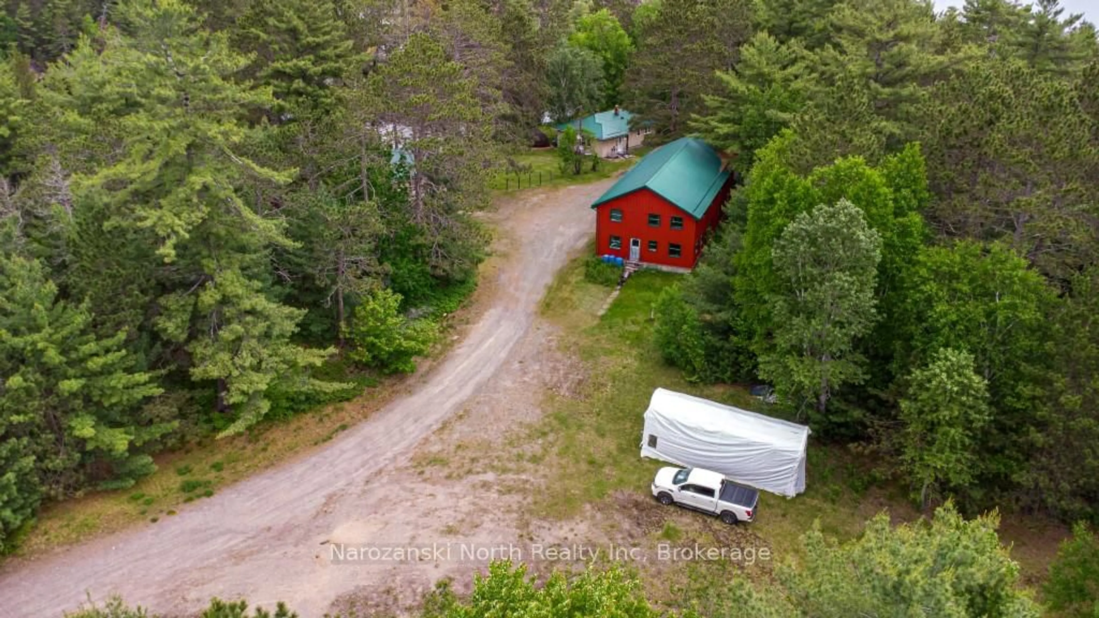 A pic from outside/outdoor area/front of a property/back of a property/a pic from drone, unknown for 8162 Hwy 64 Highway, French River Ontario P0M 2K0