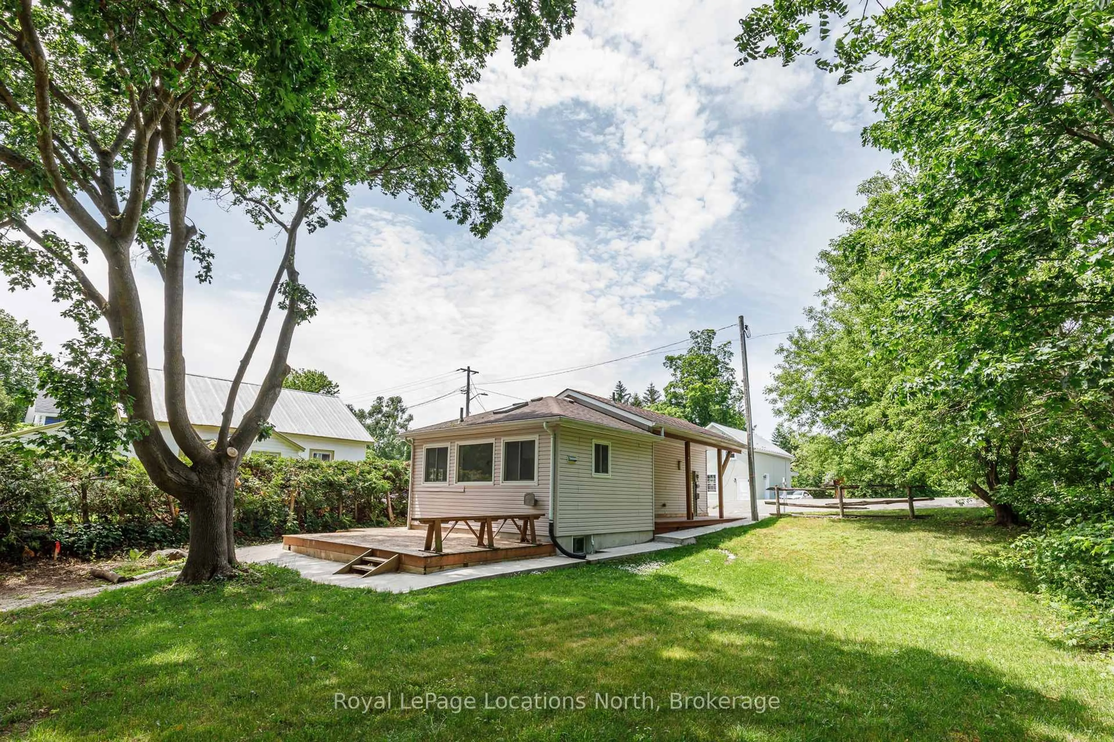 A pic from outside/outdoor area/front of a property/back of a property/a pic from drone, water/lake/river/ocean view for 213 Marsh St, Blue Mountains Ontario N0H 1J0