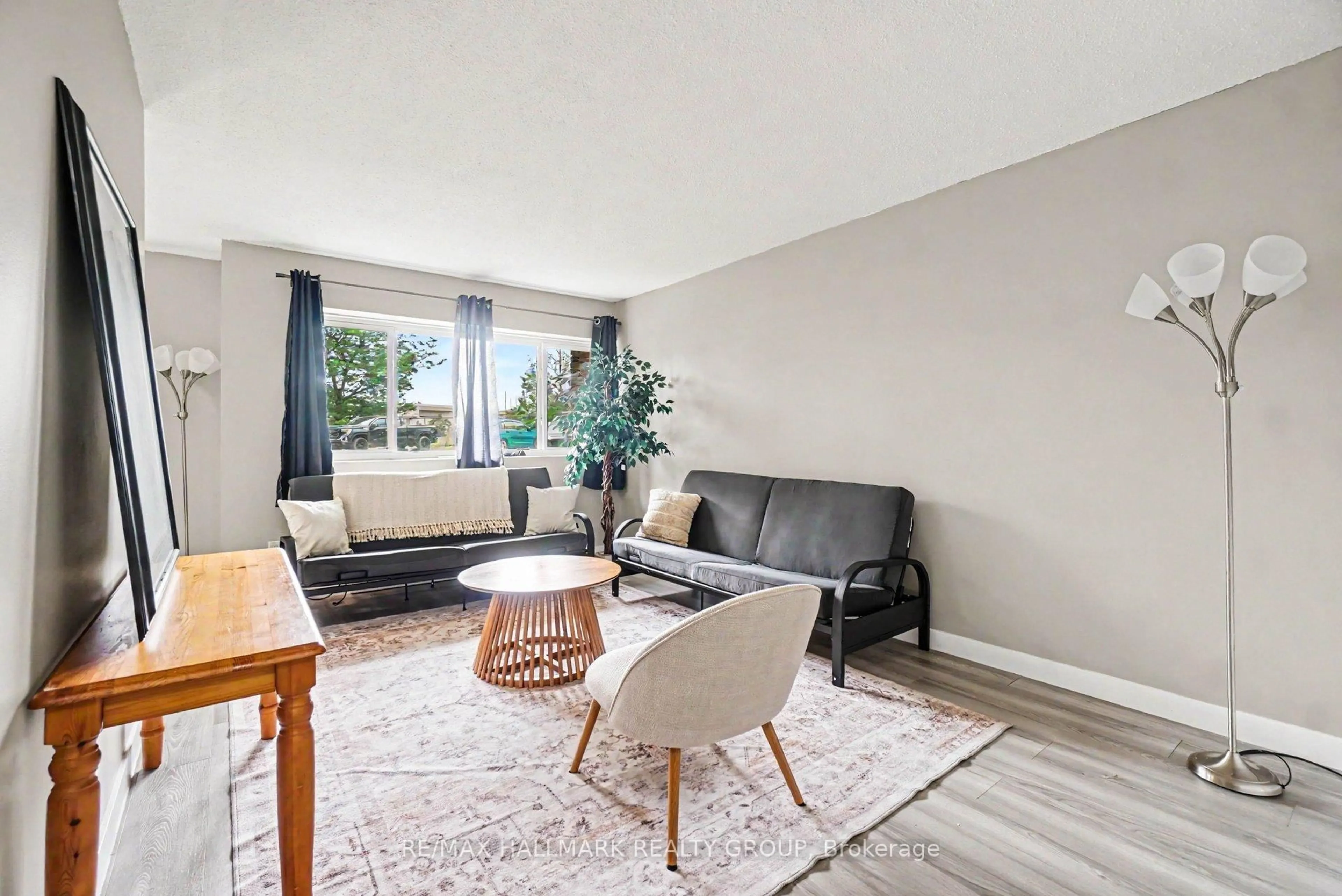 Living room with furniture, unknown for 2044 Arrowsmith Dr #106A, Ottawa Ontario K1J 7V8