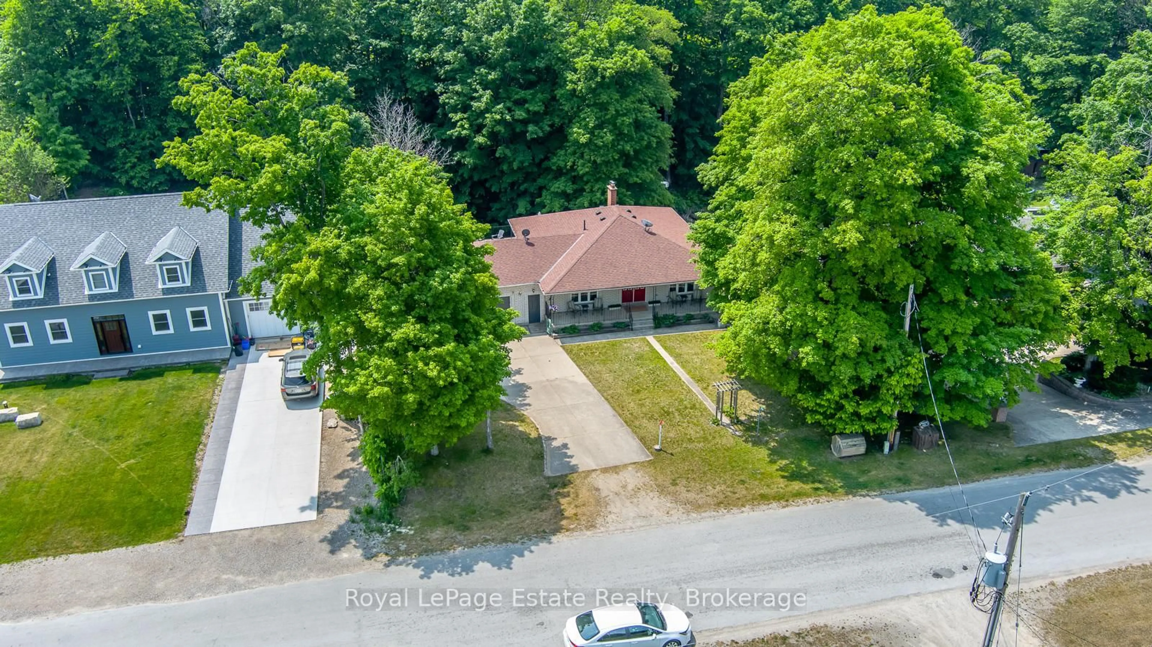 A pic from outside/outdoor area/front of a property/back of a property/a pic from drone, street for 632 Bannister Dr, South Bruce Peninsula Ontario N0H 2G0
