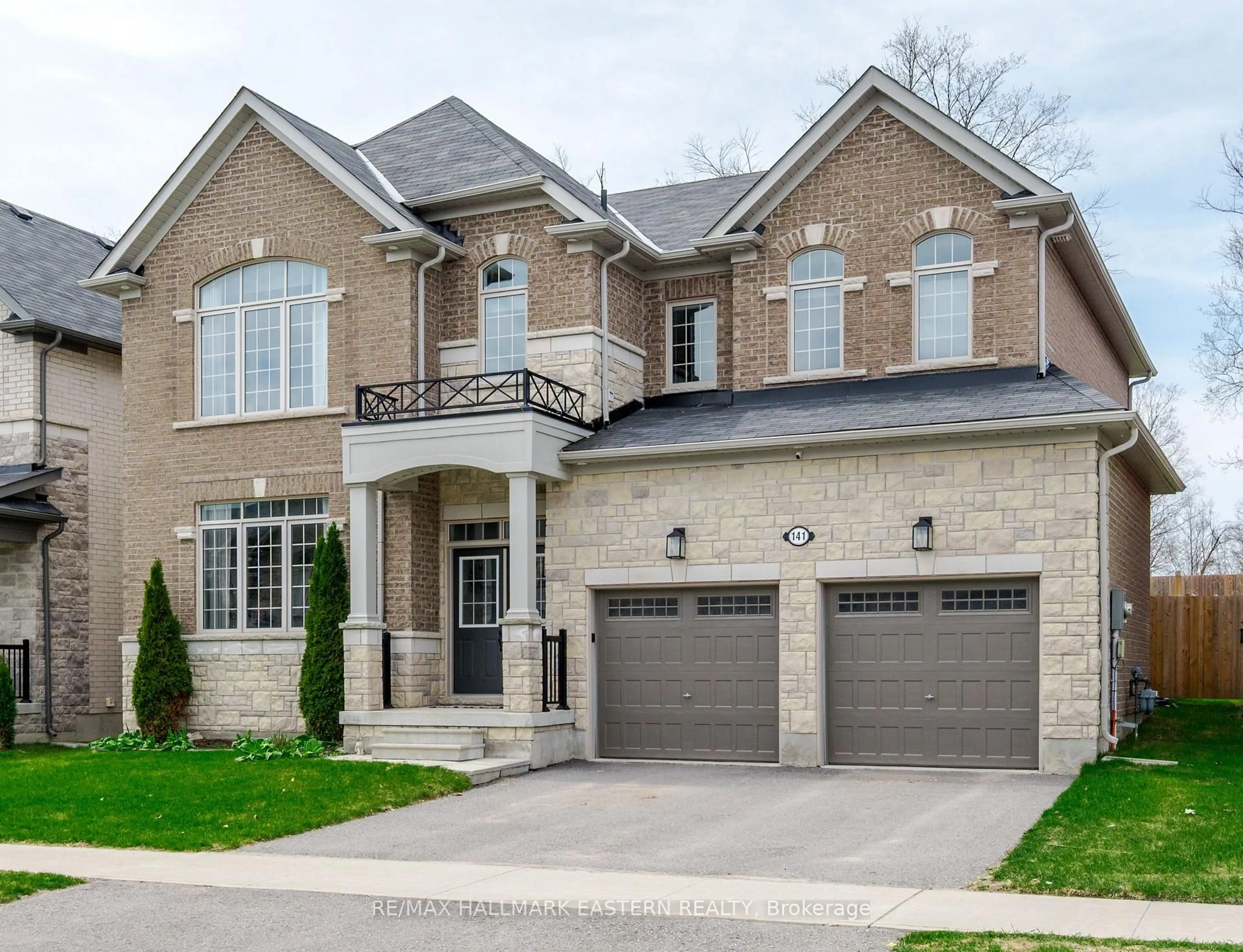 Home with brick exterior material, street for 141 Highlands Blvd, Cavan Monaghan Ontario L0A 1G0