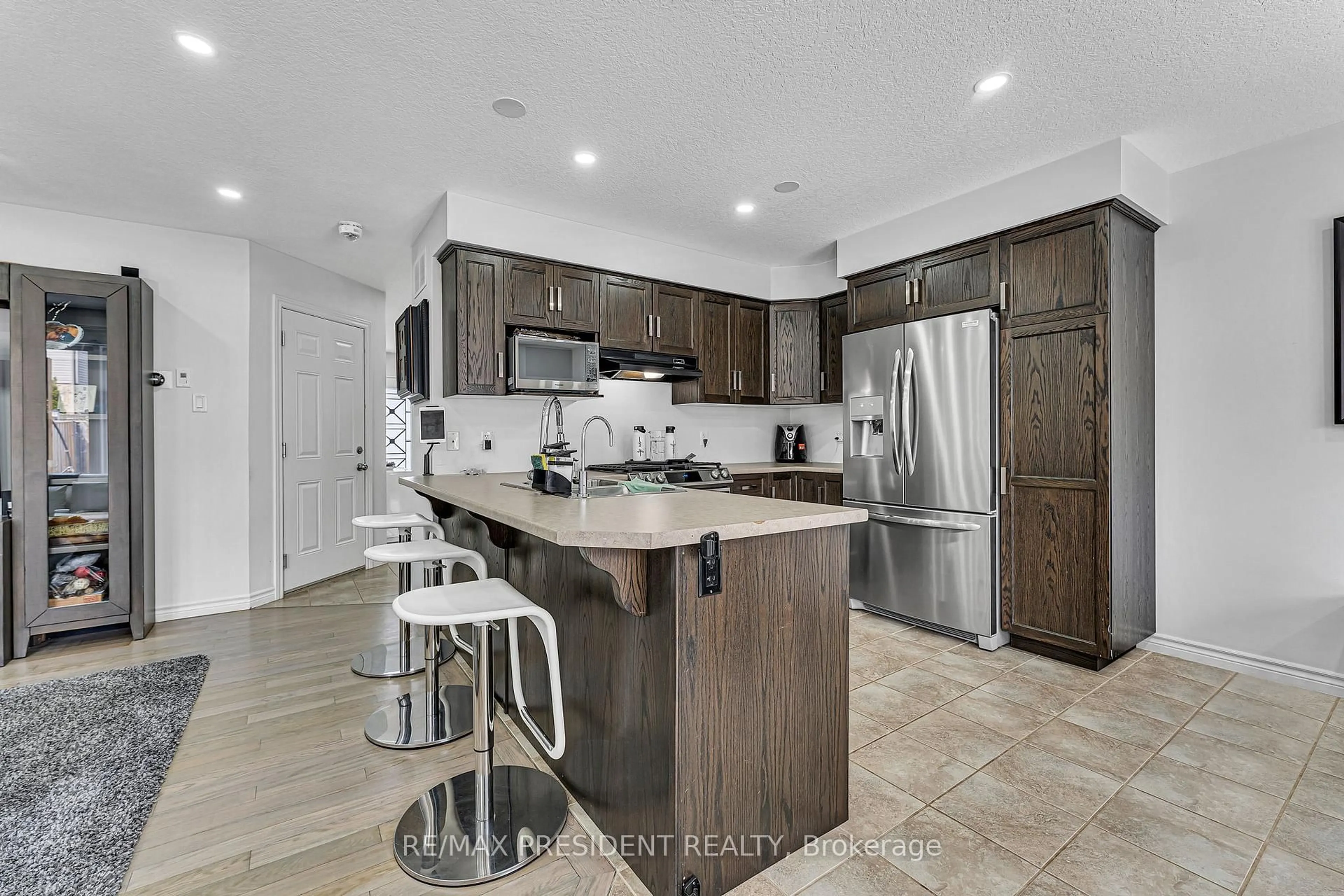 Open concept kitchen, ceramic/tile floor for 573 Forman Ave, Stratford Ontario N5A 0B3