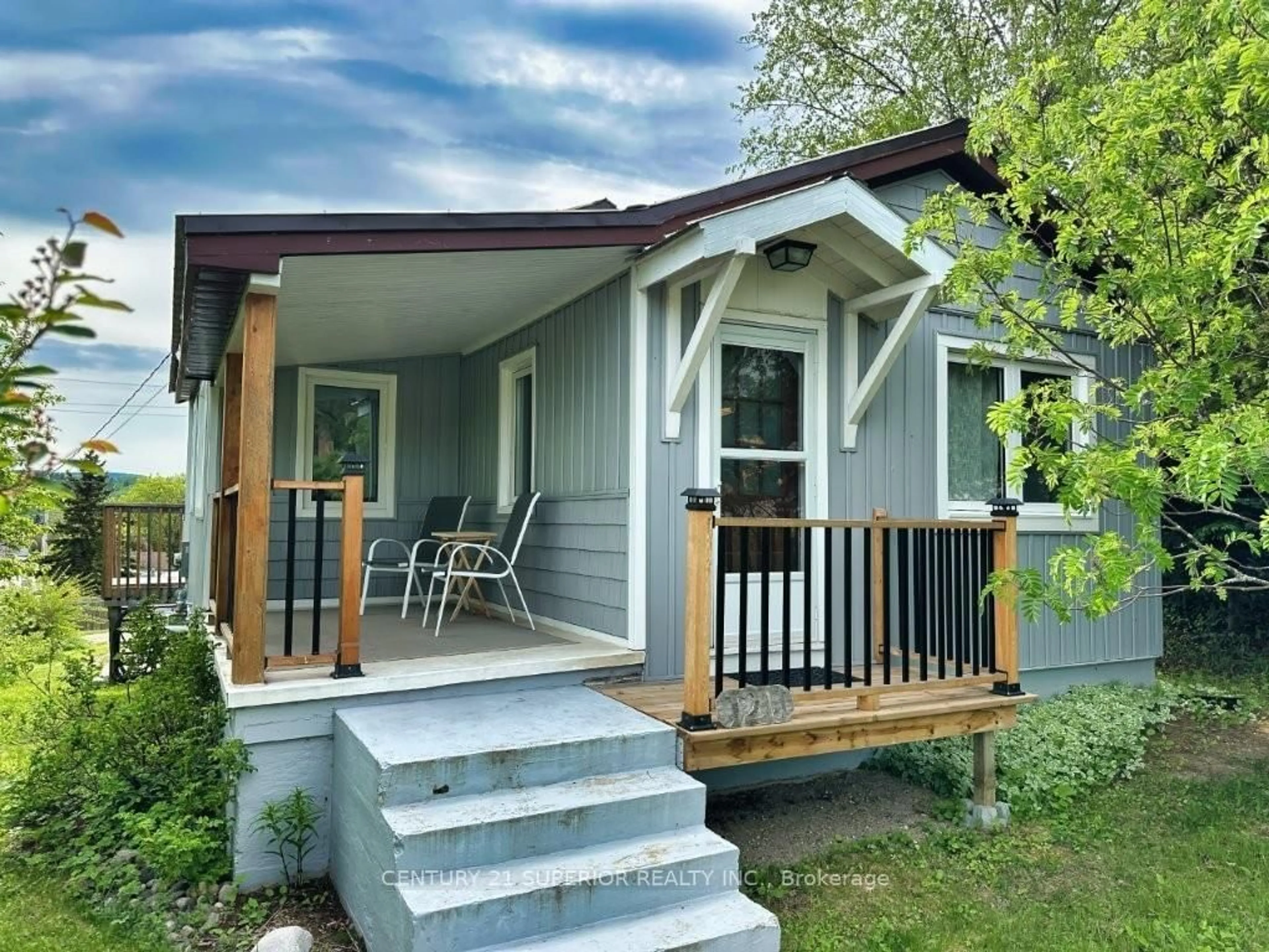 Home with vinyl exterior material, street for 120 7th Street, Nipigon Ontario P0T 2J0