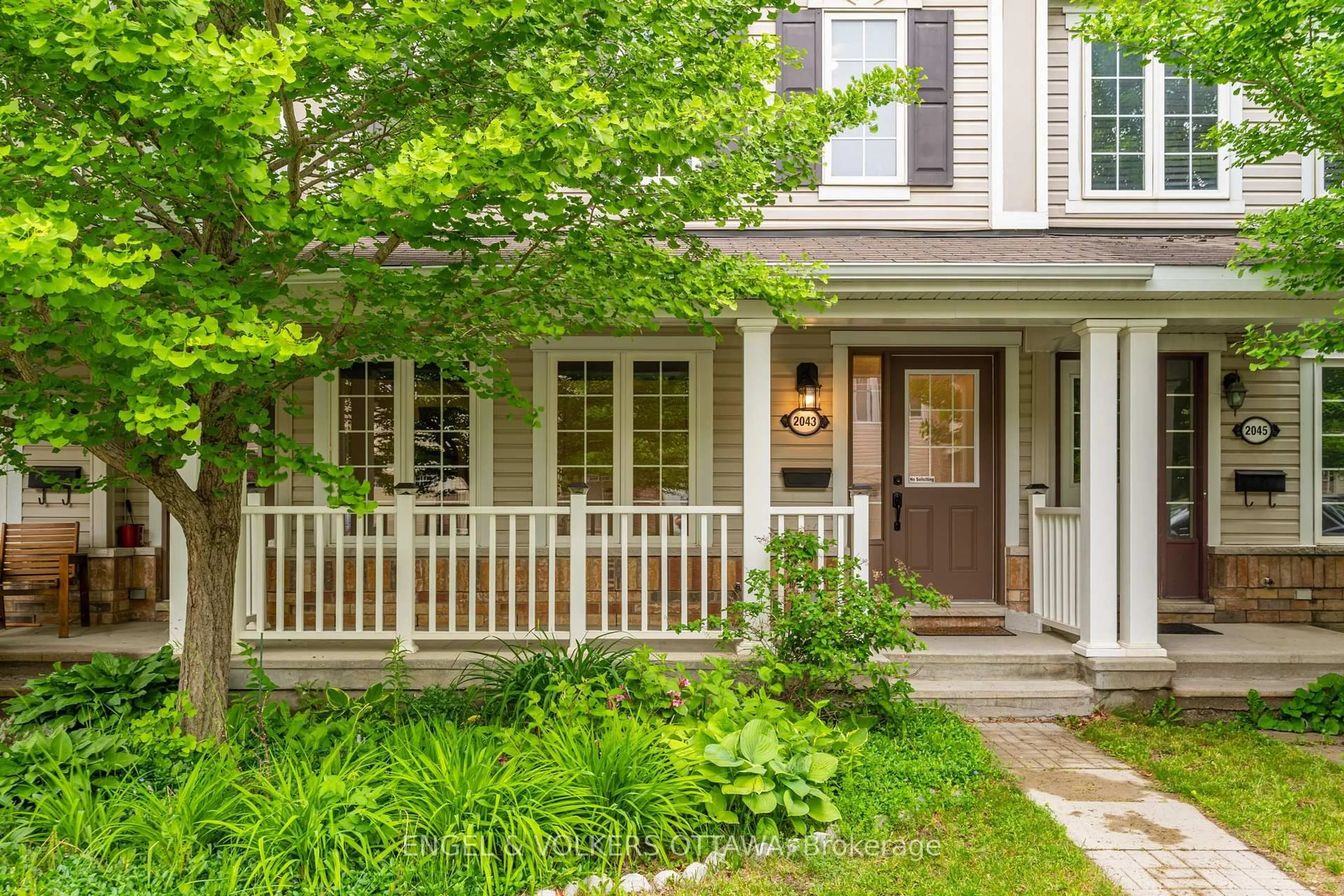 Home with vinyl exterior material, street for 2043 MADRID Ave, Ottawa Ontario K2J 0K1