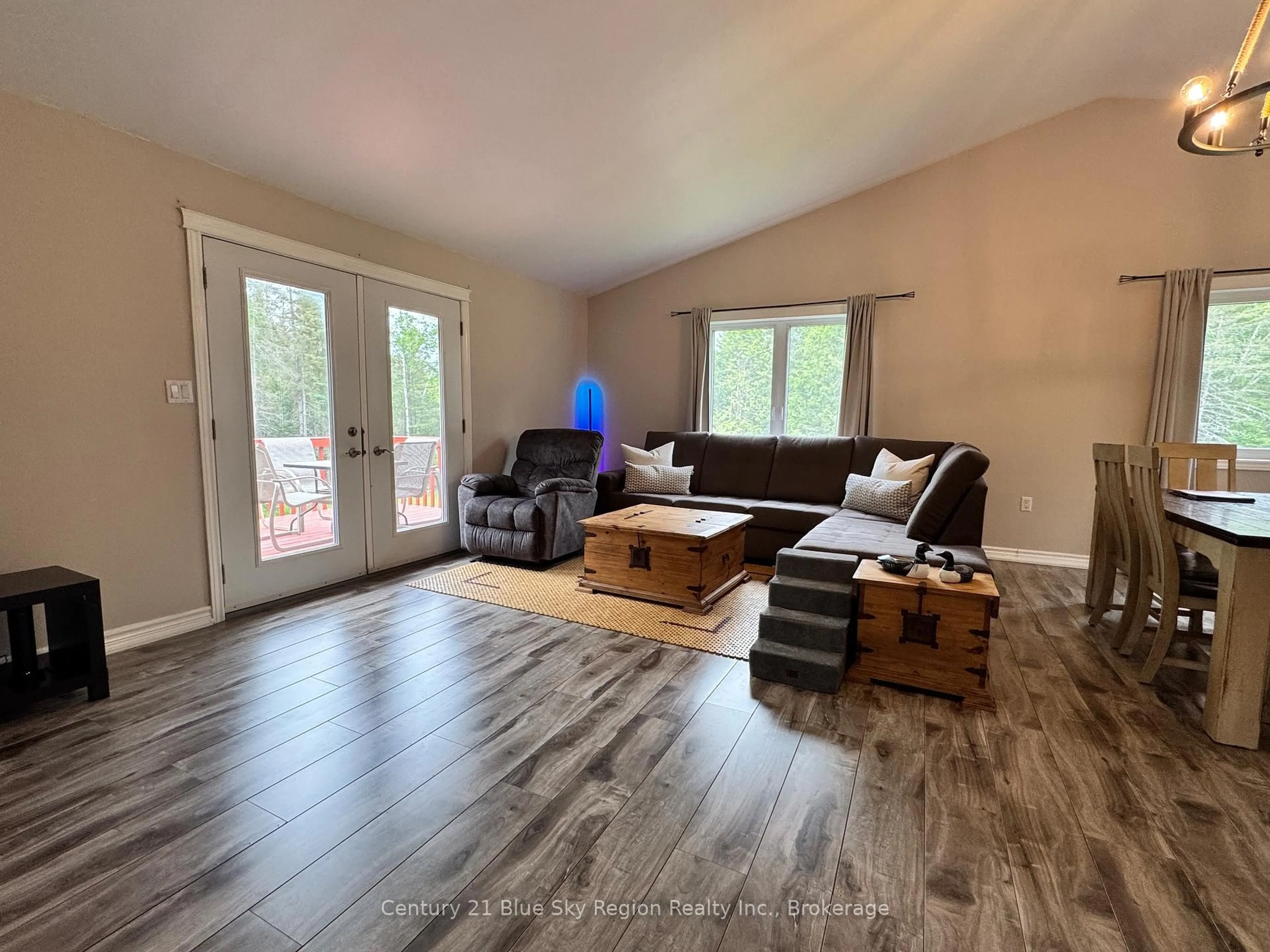 Living room with furniture, wood/laminate floor for 2161 Papineau Rd, Papineau-Cameron Ontario P0H 1V0