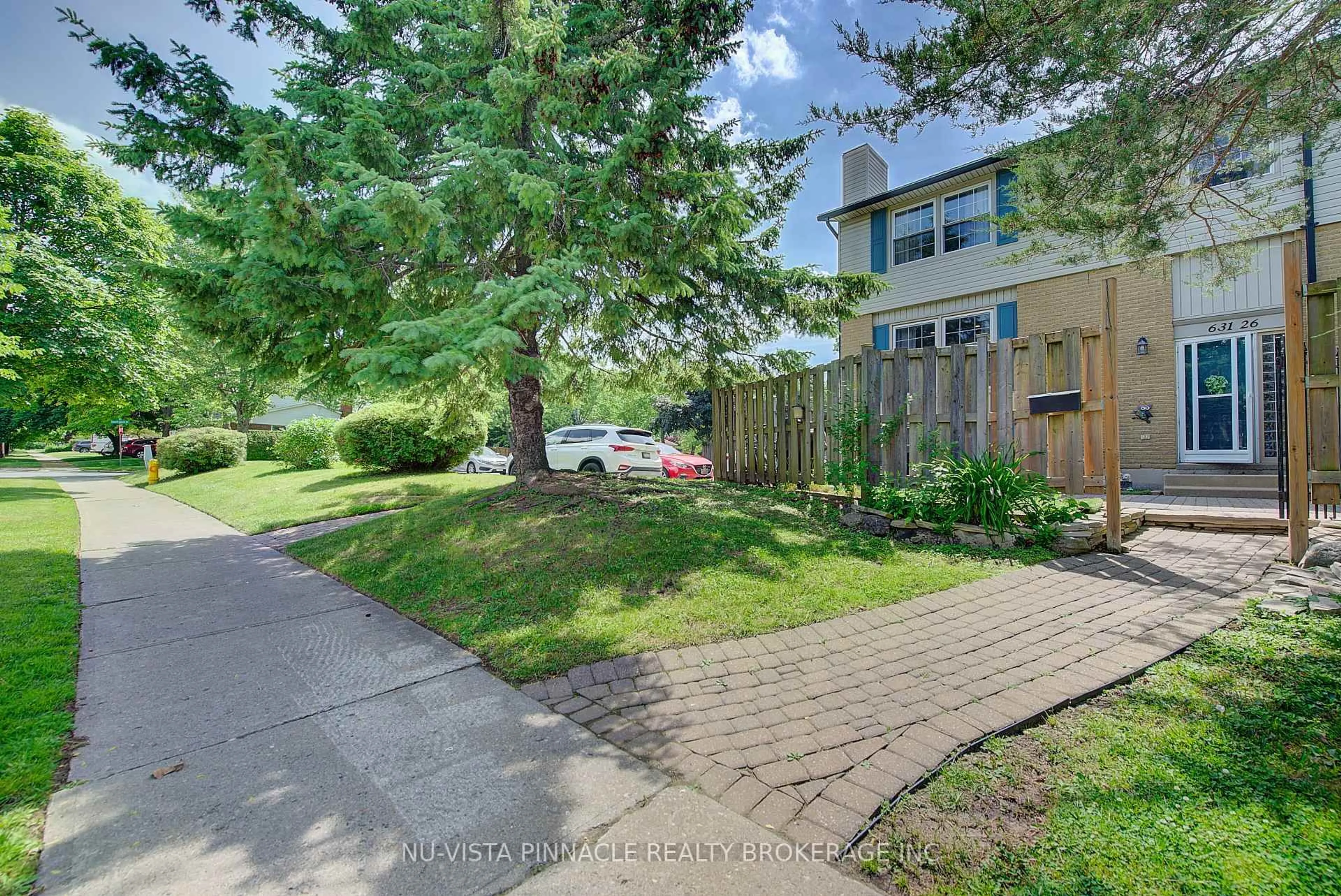 A pic from outside/outdoor area/front of a property/back of a property/a pic from drone, street for 631 Cranbrook Rd #26, London South Ontario N6K 2Y4