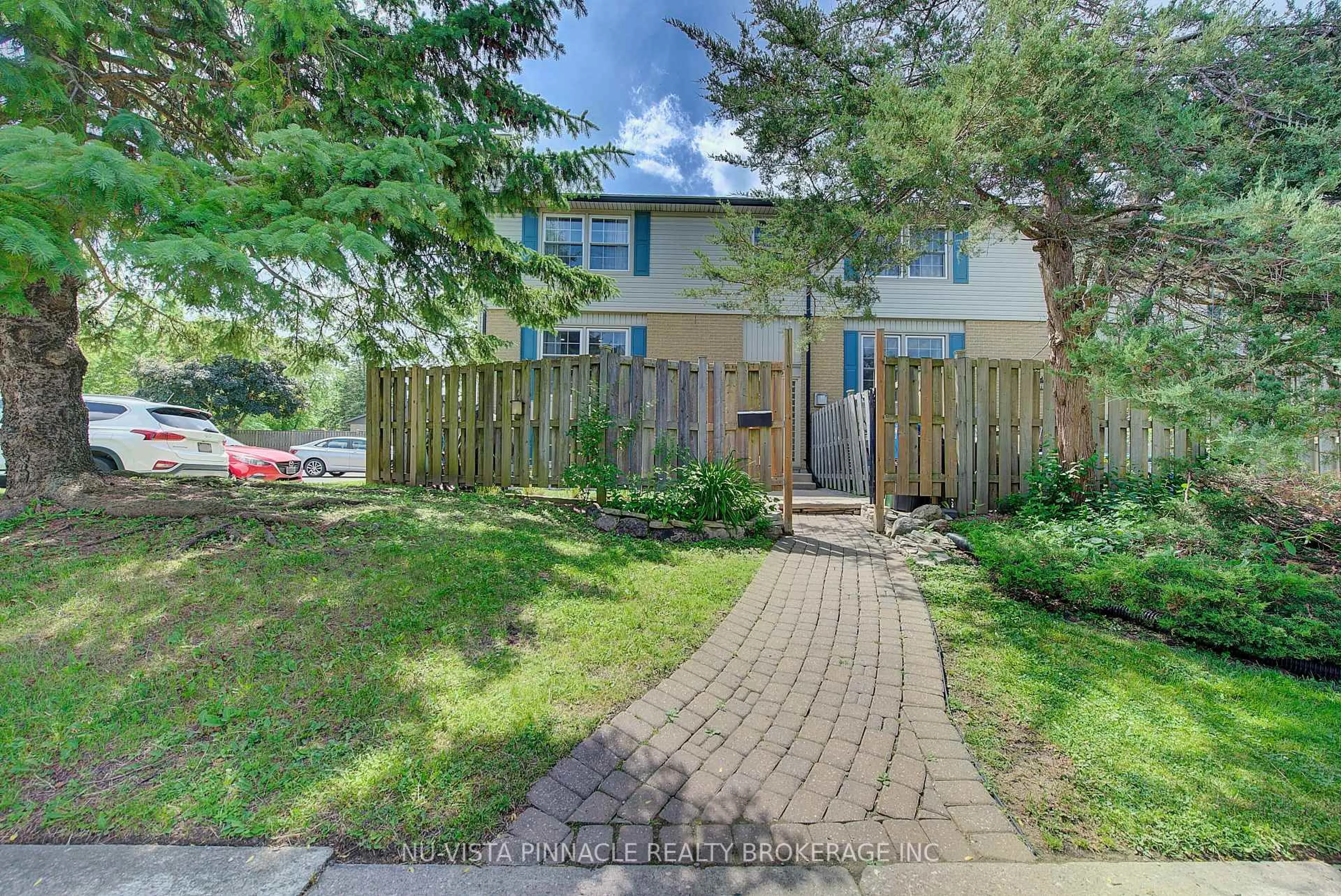 A pic from outside/outdoor area/front of a property/back of a property/a pic from drone, street for 631 Cranbrook Rd #26, London South Ontario N6K 2Y4