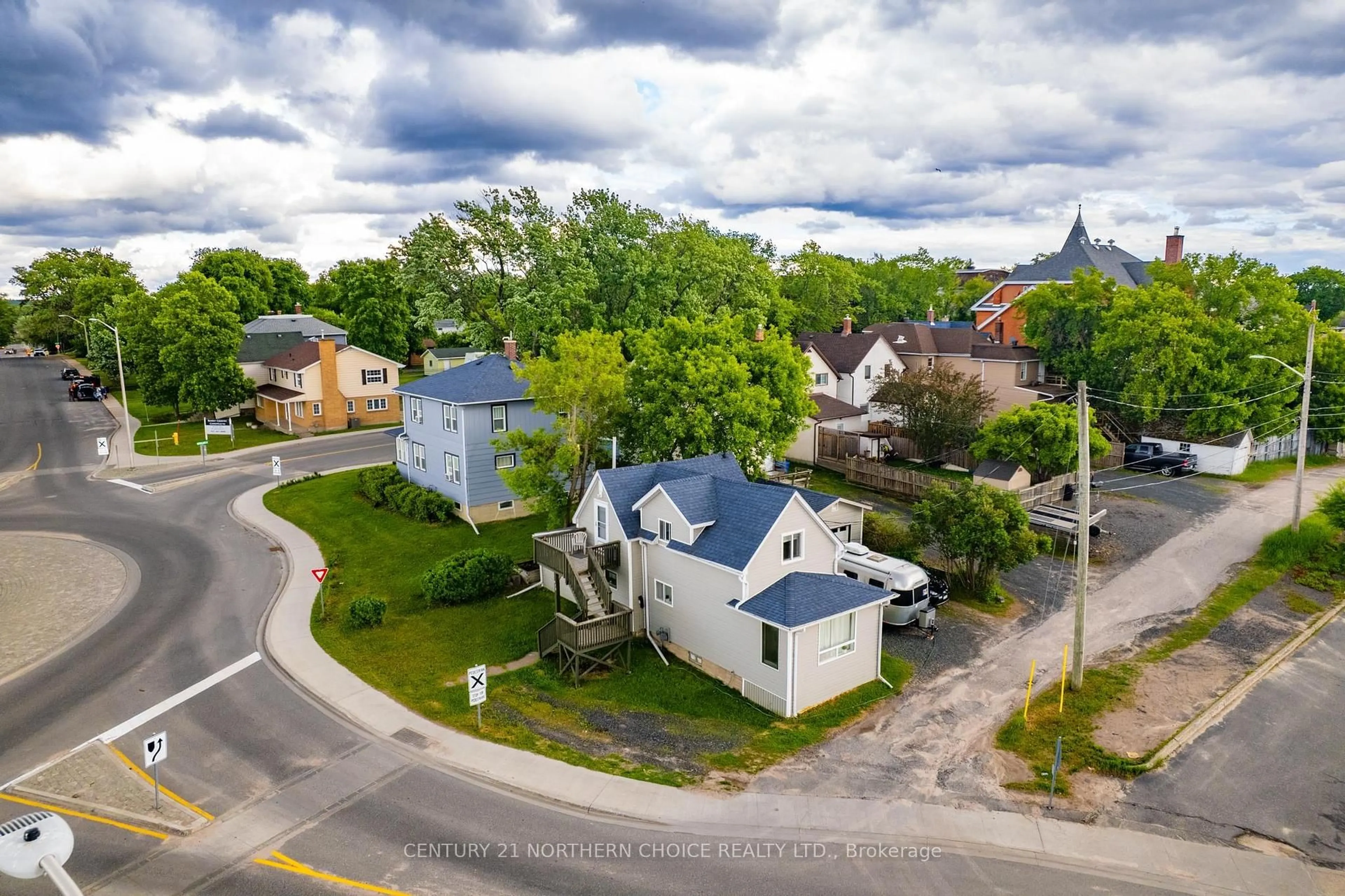 A pic from outside/outdoor area/front of a property/back of a property/a pic from drone, street for 415 First Street South, Kenora Ontario P9N 1C7