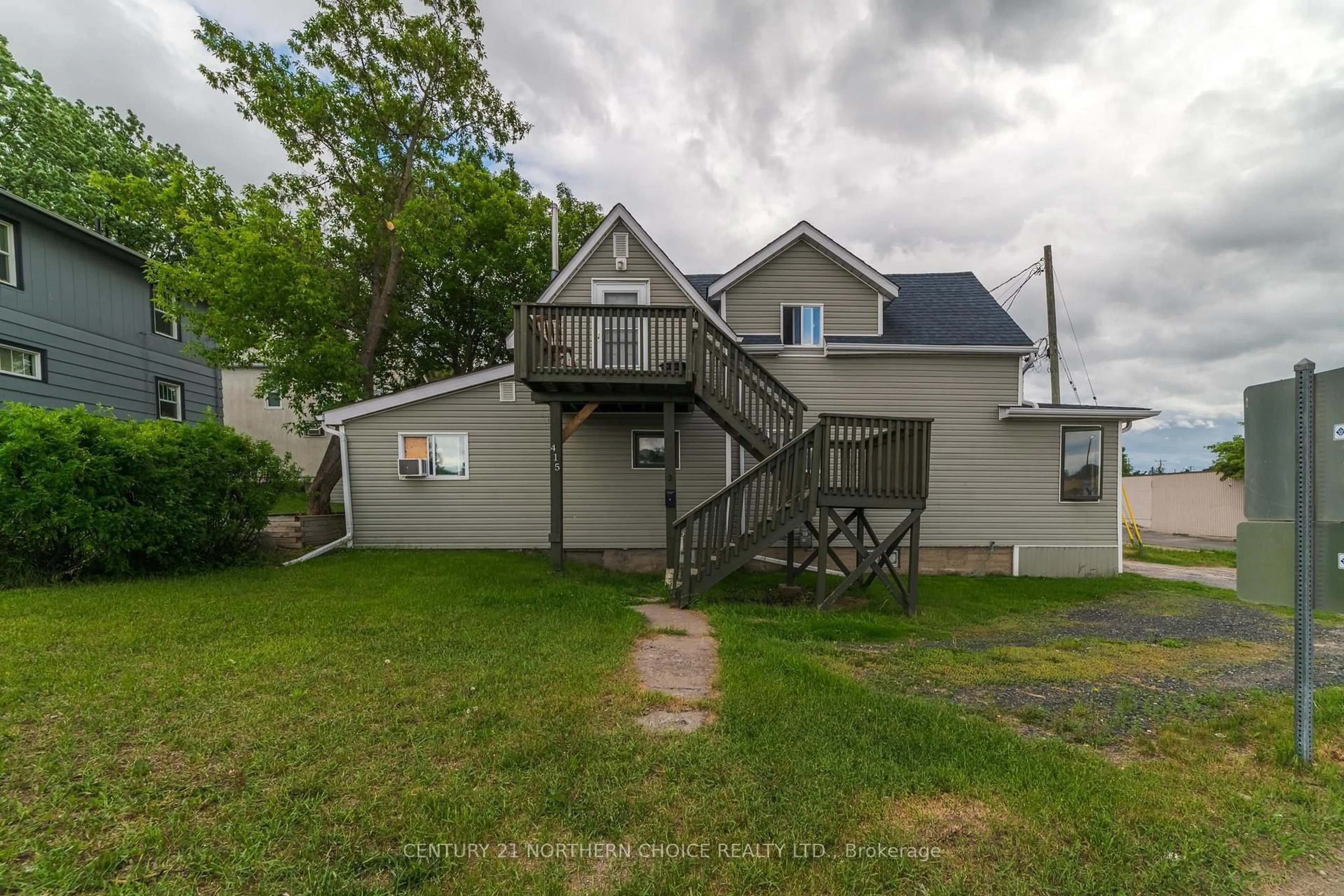 A pic from outside/outdoor area/front of a property/back of a property/a pic from drone, street for 415 First Street South, Kenora Ontario P9N 1C7