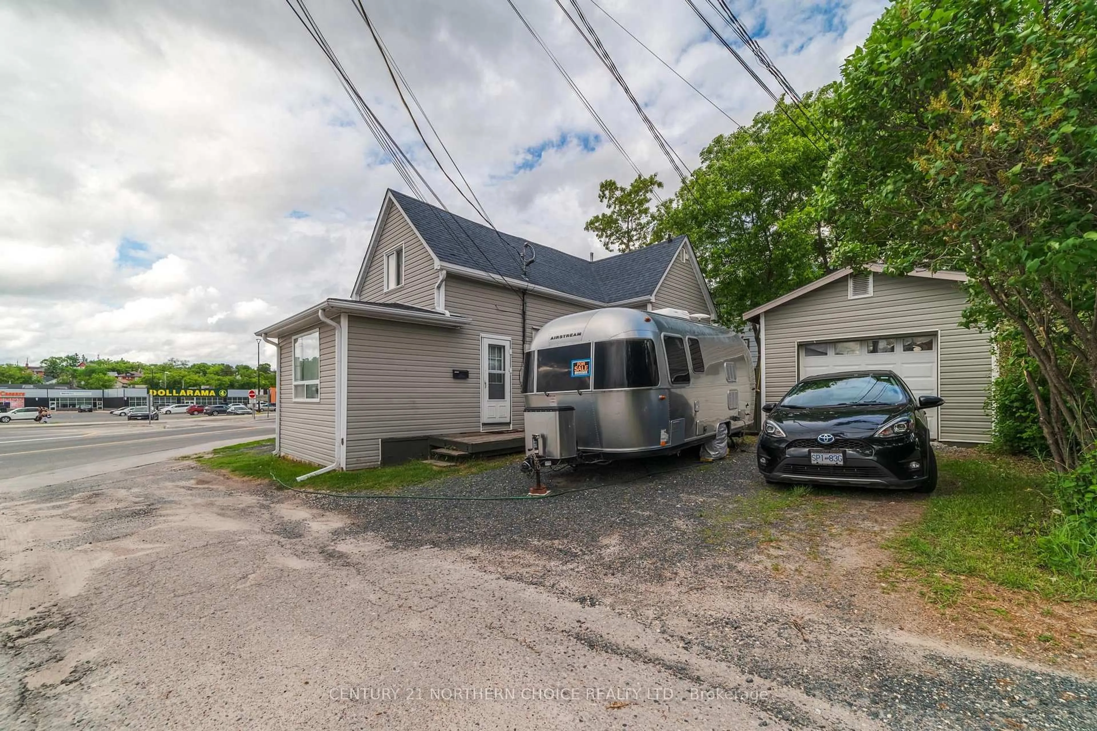 A pic from outside/outdoor area/front of a property/back of a property/a pic from drone, street for 415 First Street South, Kenora Ontario P9N 1C7