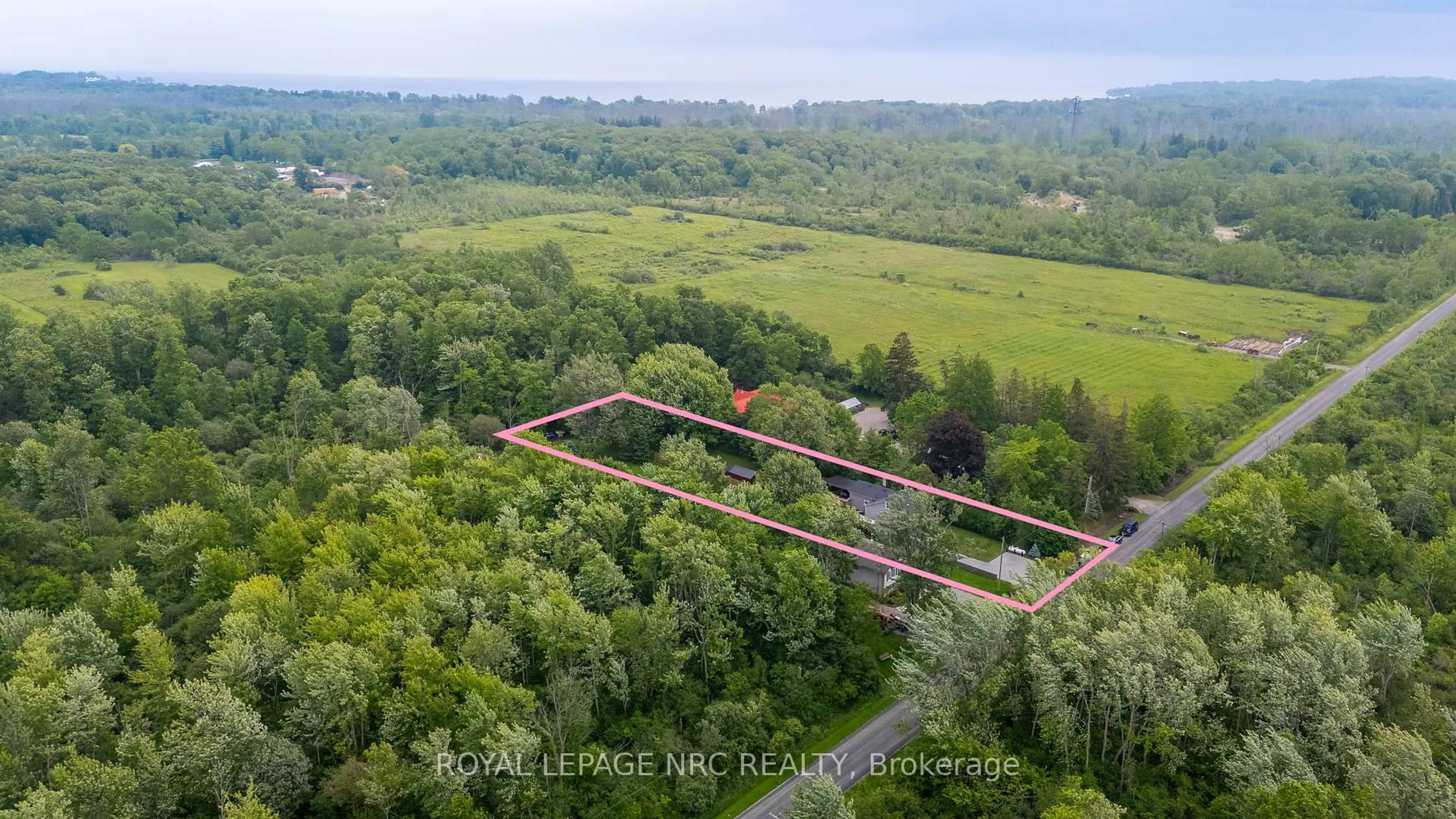 A pic from outside/outdoor area/front of a property/back of a property/a pic from drone, forest/trees view for 150 Mathews Rd, Fort Erie Ontario L0S 1R0