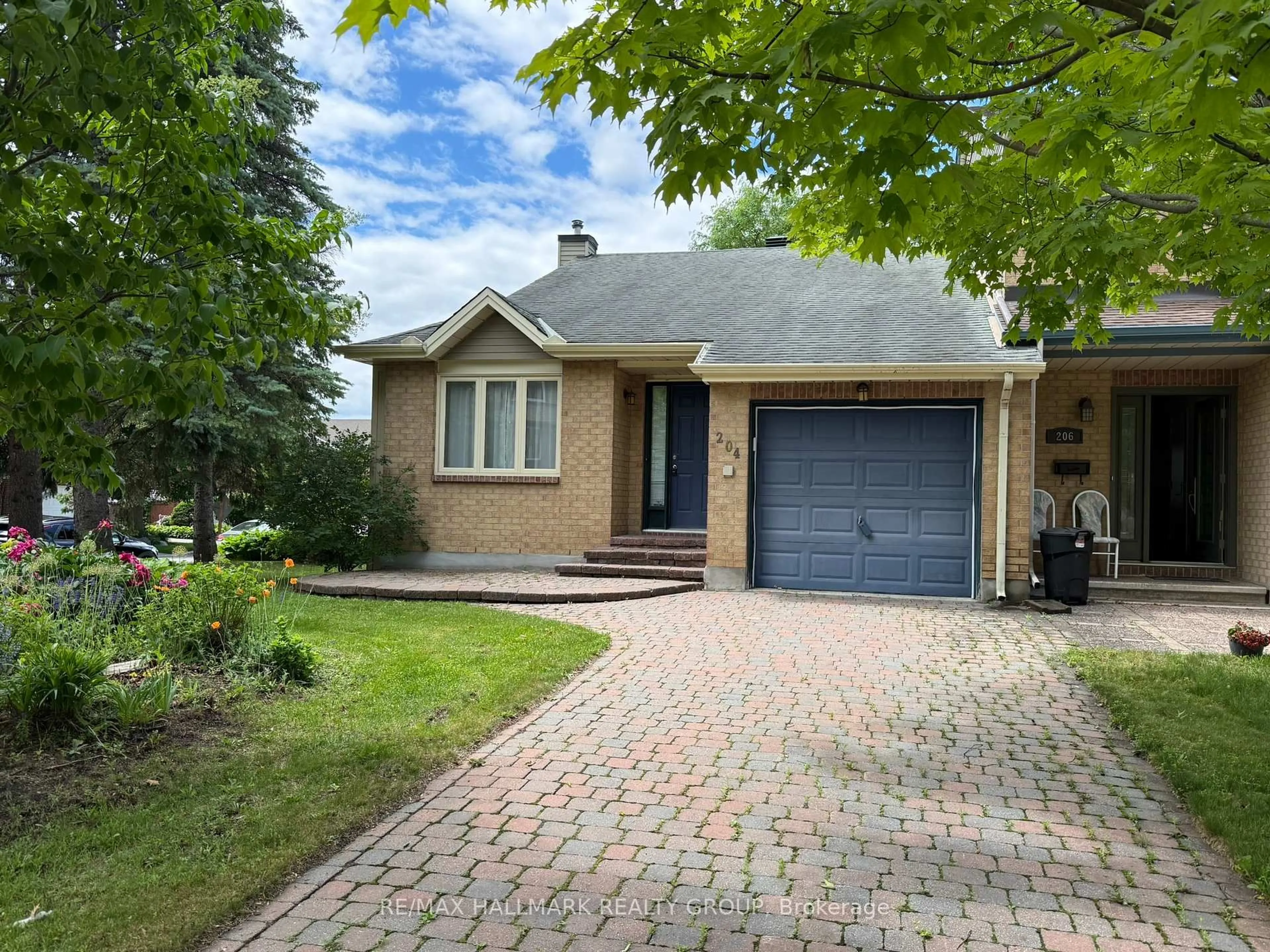 Home with brick exterior material, street for 204 Dunbarton Crt, Ottawa Ontario K1K 4L7