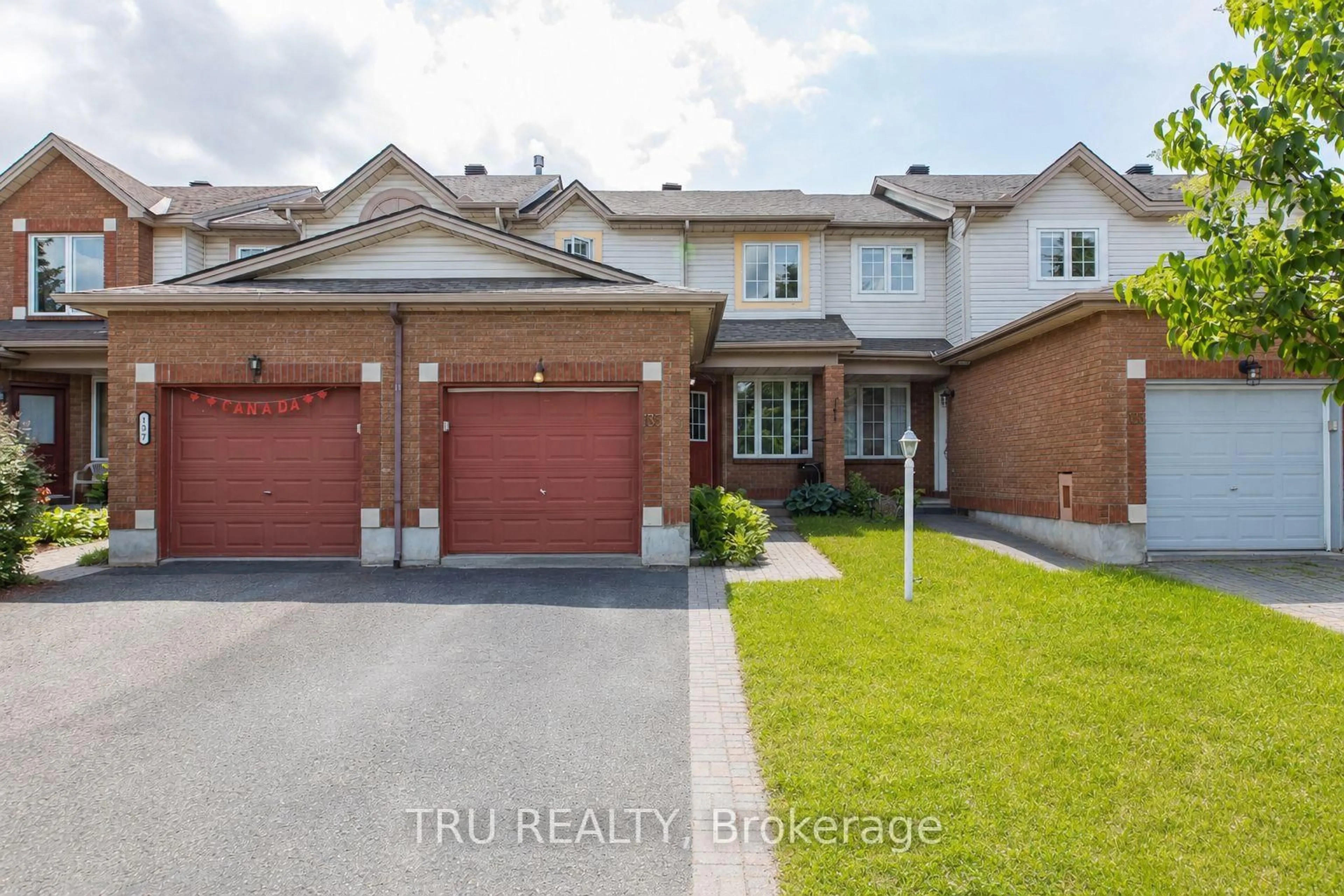 Home with brick exterior material, street for 135 Margrave Ave, Ottawa Ontario K1T 3X8