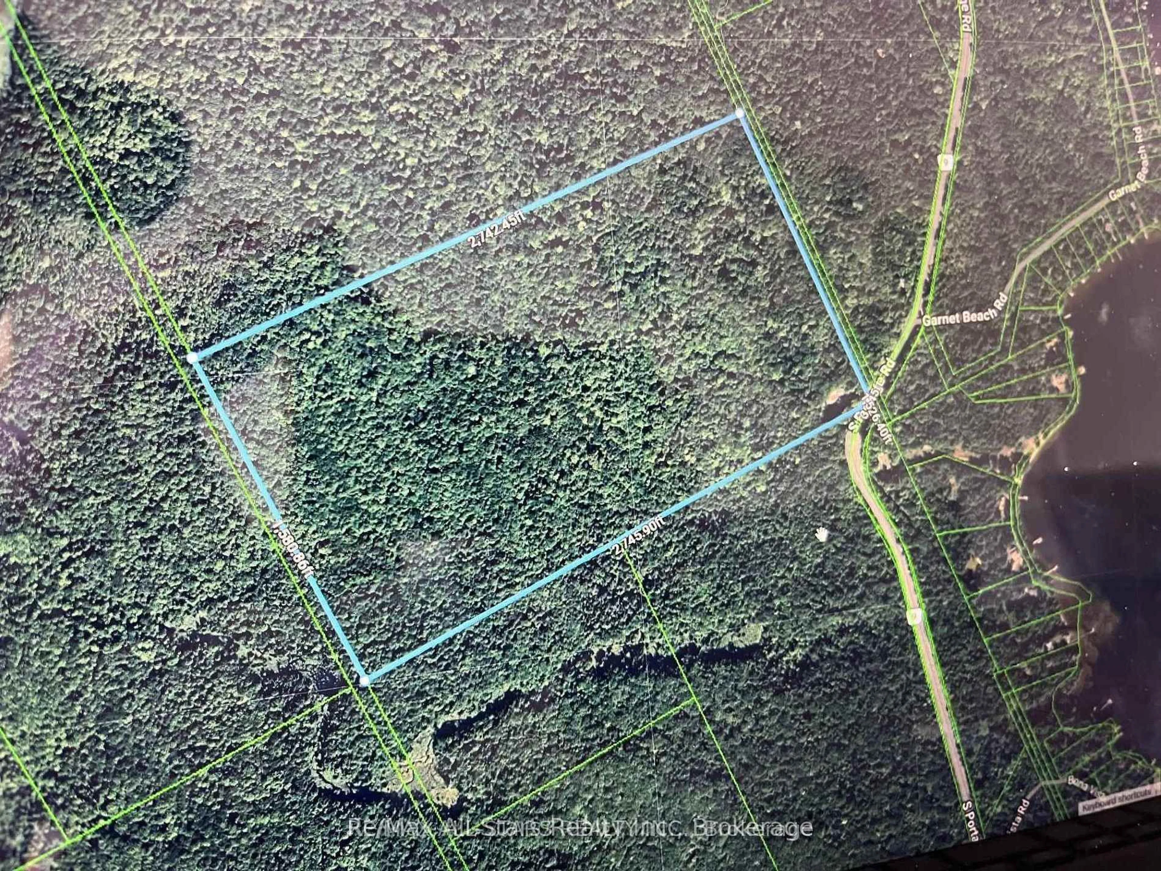 A pic from outside/outdoor area/front of a property/back of a property/a pic from drone, forest/trees view for 2406 South Portage Rd, Huntsville Ontario P1H 2J3