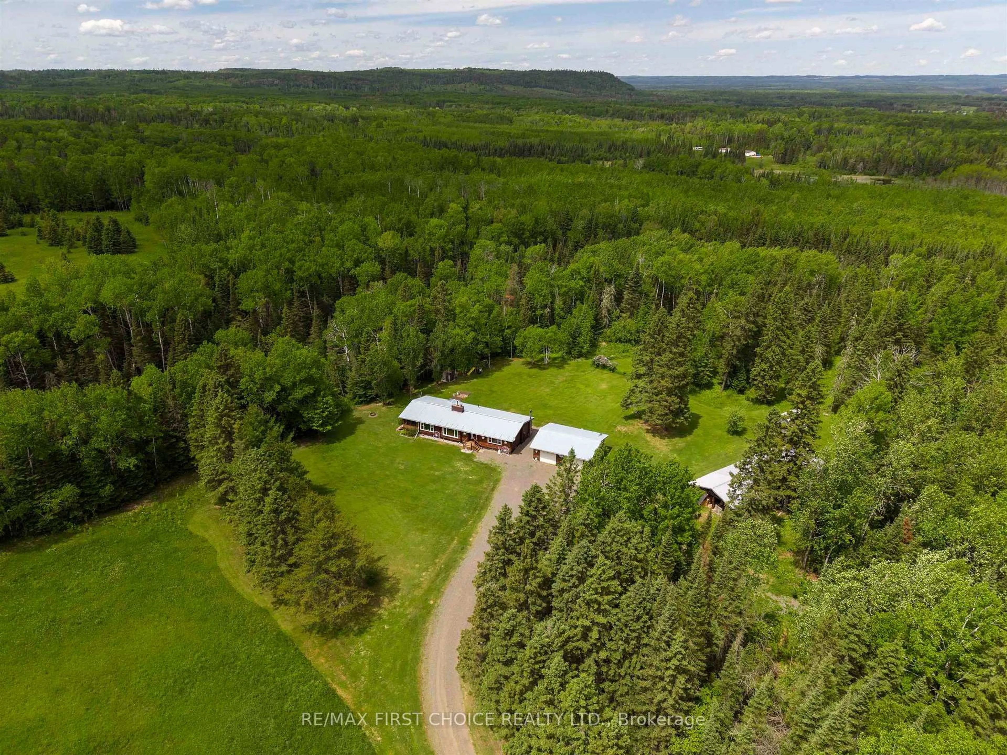 A pic from outside/outdoor area/front of a property/back of a property/a pic from drone, forest/trees view for 61 Oliver Creek Rd, Neebing Ontario P7L 0C3