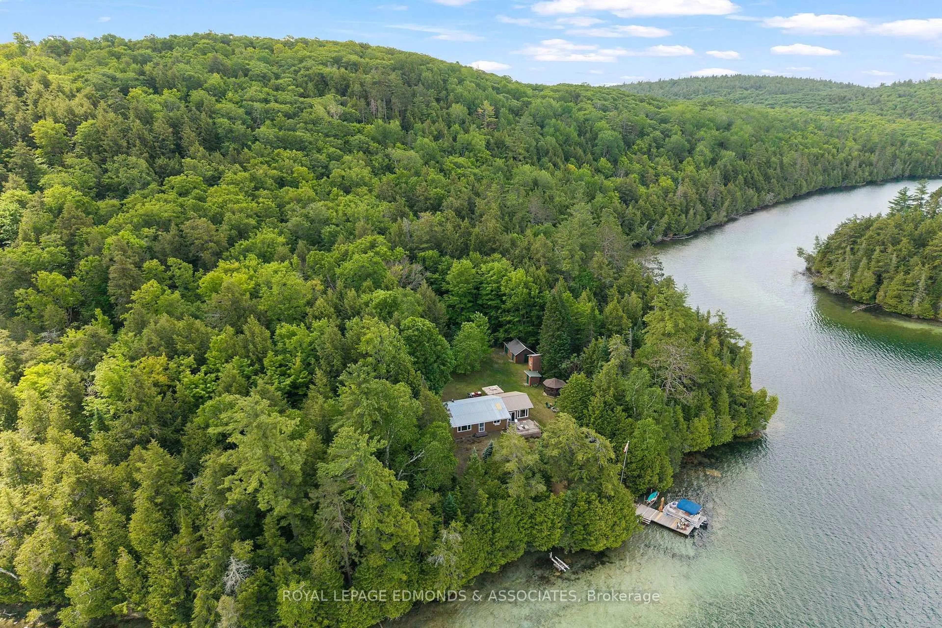 A pic from outside/outdoor area/front of a property/back of a property/a pic from drone, water/lake/river/ocean view for 1384A Centennial Lake Rd, Calabogie Ontario K0J 1H0