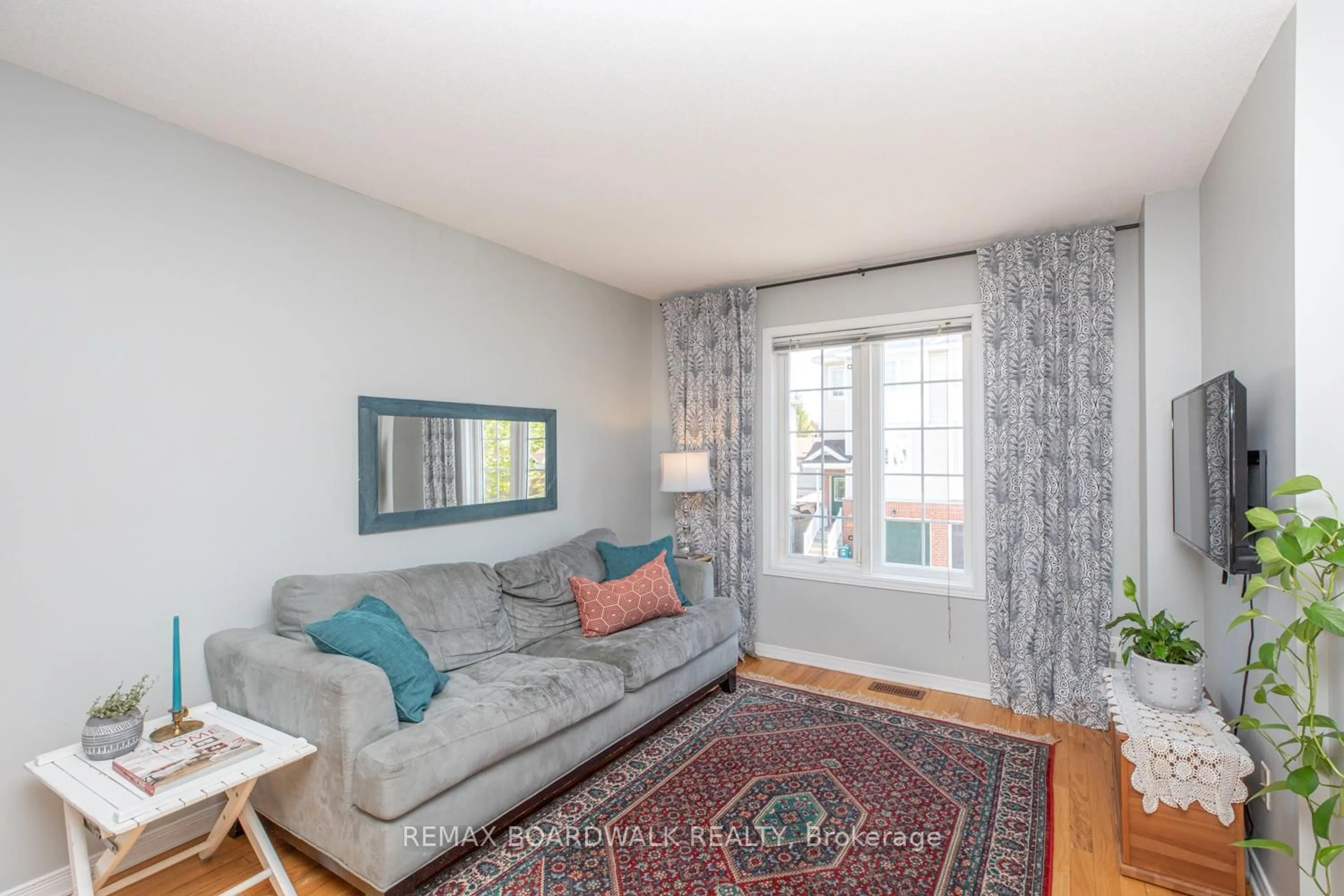 Living room with furniture, unknown for 112 Wharhol Private, Ottawa Ontario K2H 1G6