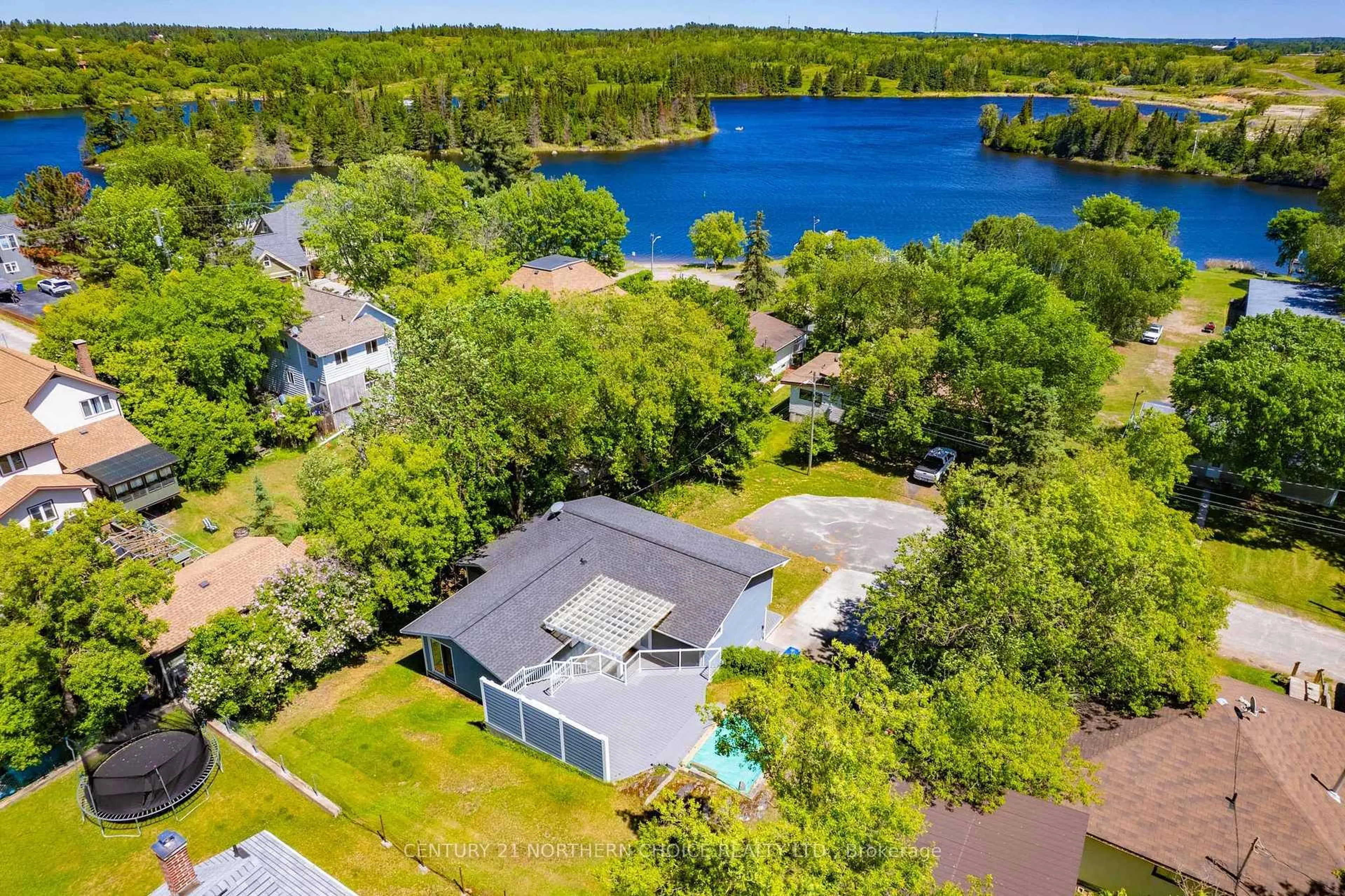 A pic from outside/outdoor area/front of a property/back of a property/a pic from drone, water/lake/river/ocean view for 316 Belle Avenue, Kenora Ontario P0X 1C0