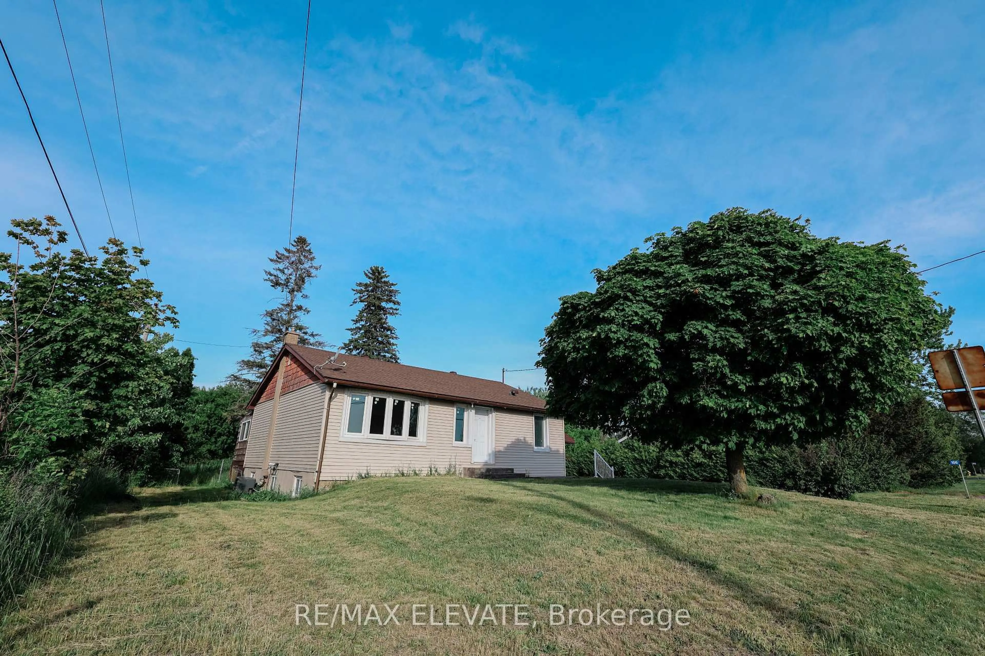A pic from outside/outdoor area/front of a property/back of a property/a pic from drone, unknown for 106 Whites Rd, Quinte West Ontario K8V 5P5