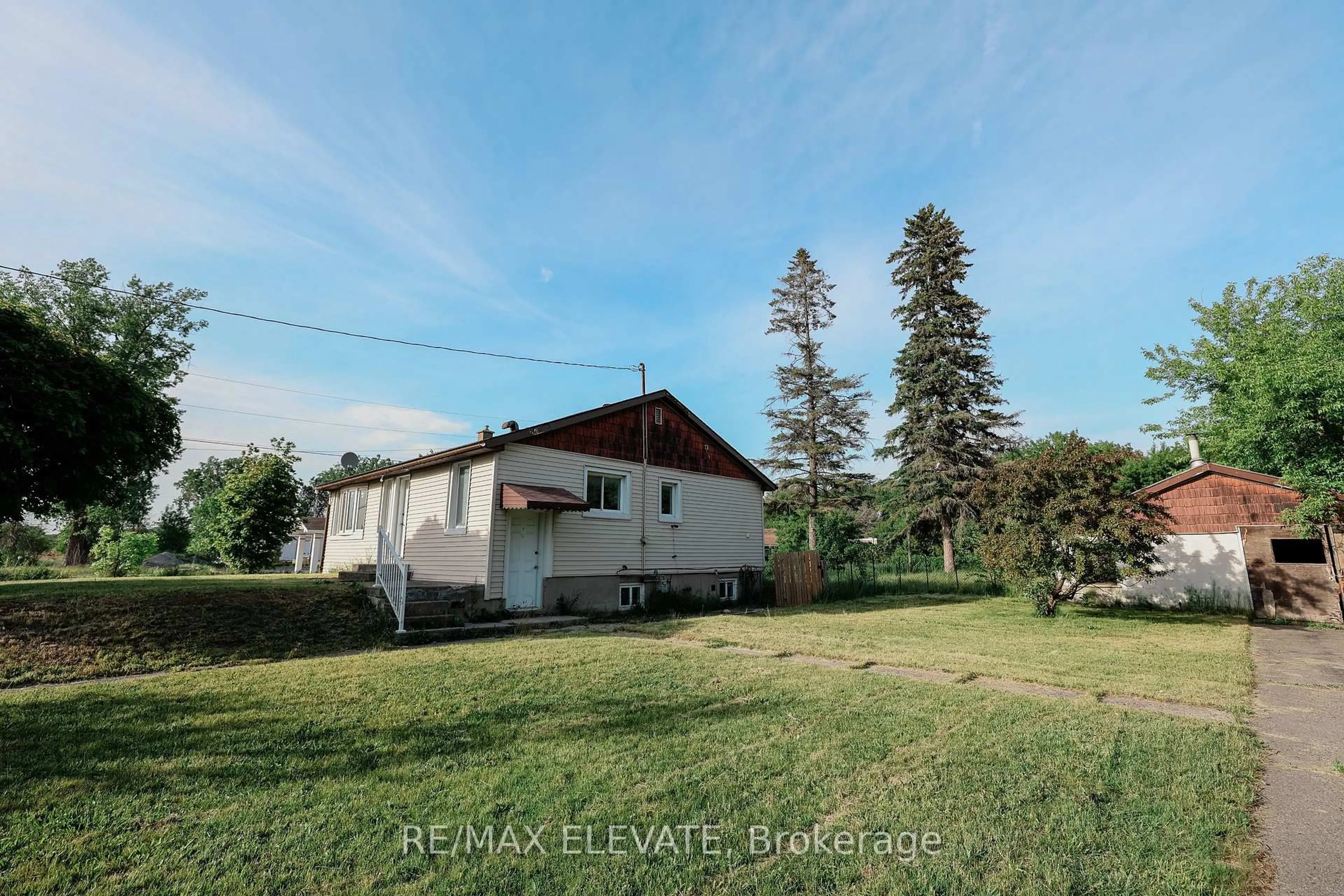 A pic from outside/outdoor area/front of a property/back of a property/a pic from drone, street for 106 Whites Rd, Quinte West Ontario K8V 5P5