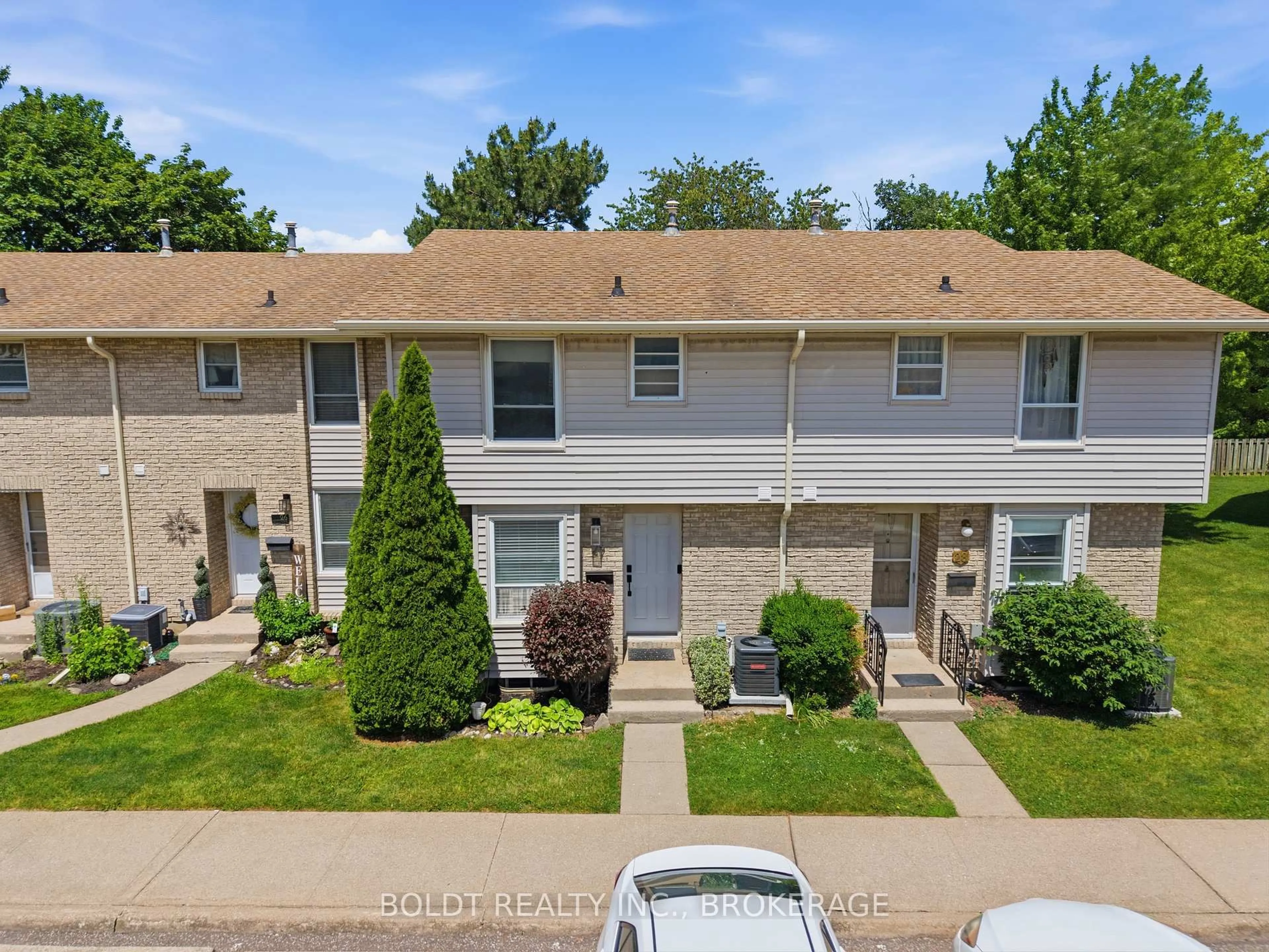 A pic from outside/outdoor area/front of a property/back of a property/a pic from drone, street for 242 Lakeport Rd #27, St. Catharines Ontario L2N 6V2