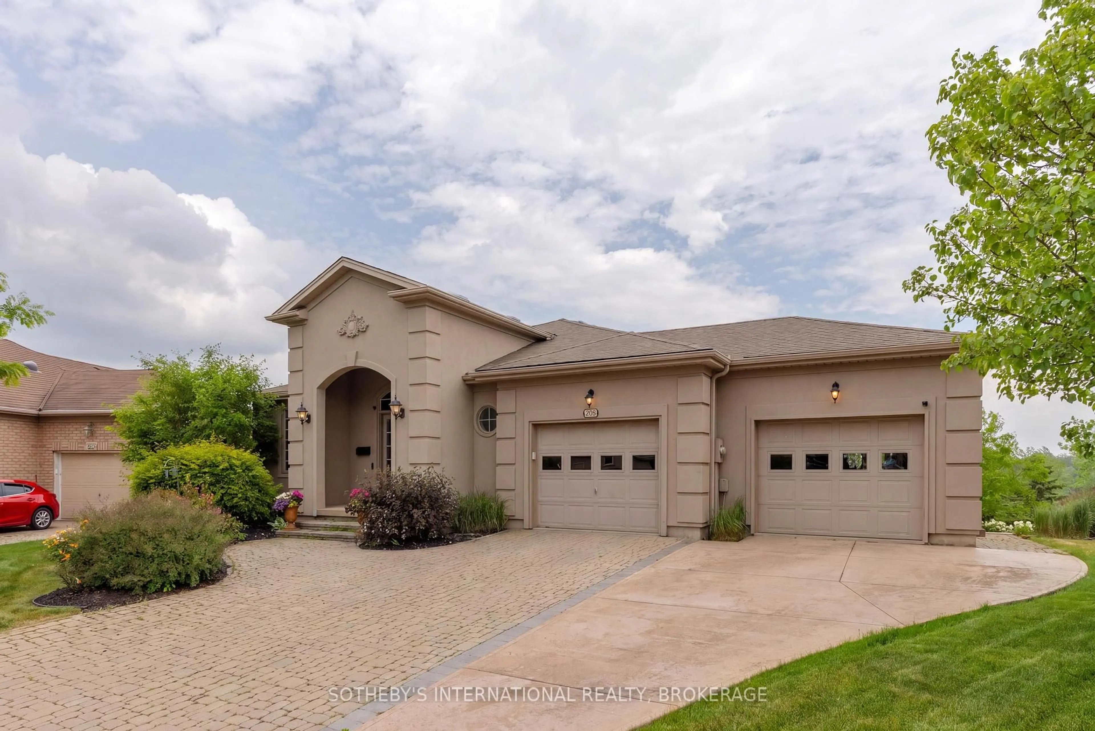 Home with brick exterior material, street for 208 Muirfield Tr, Welland Ontario L3B 6G7