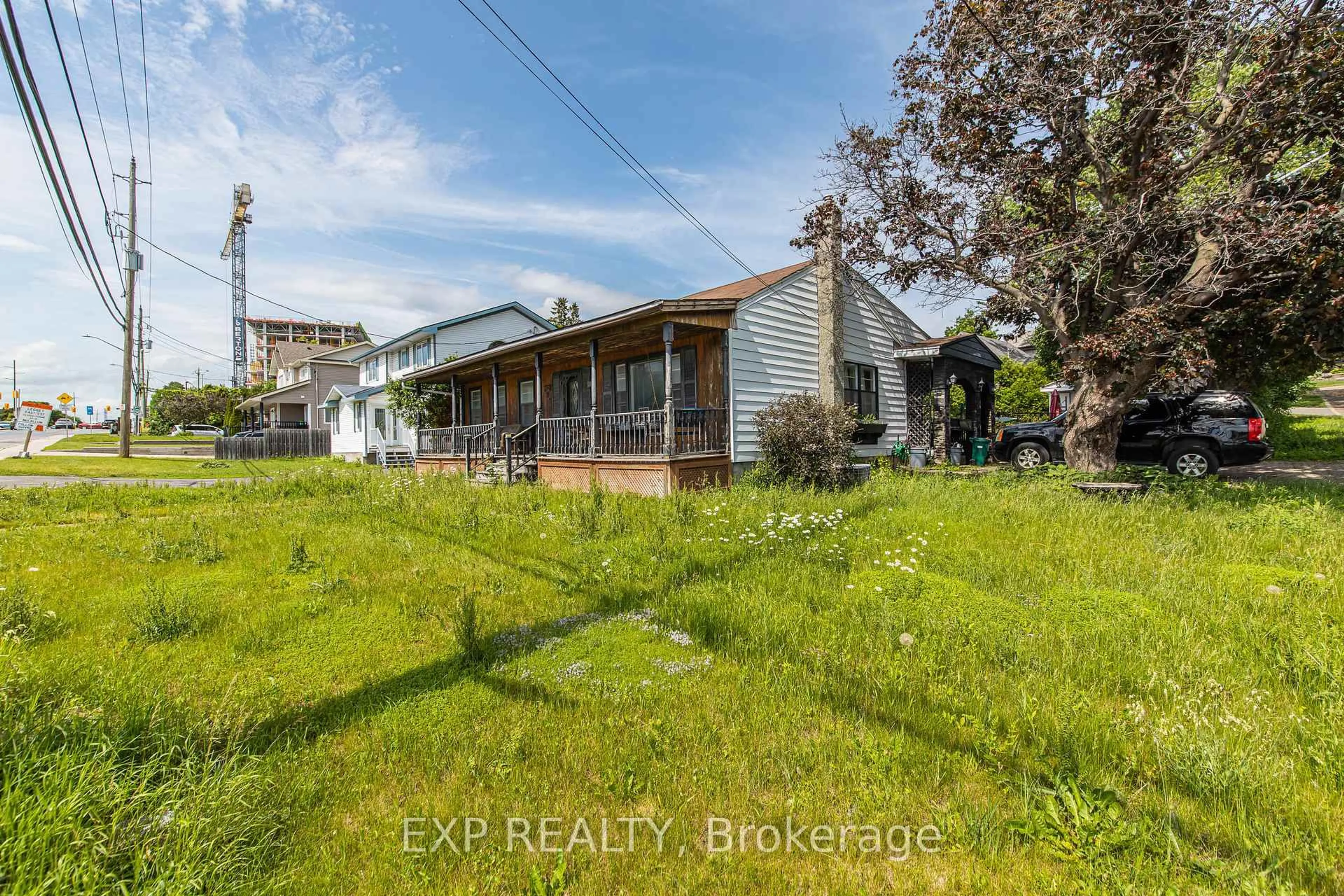 A pic from outside/outdoor area/front of a property/back of a property/a pic from drone, unknown for 789 Blair Rd, Ottawa Ontario K1J 7M5